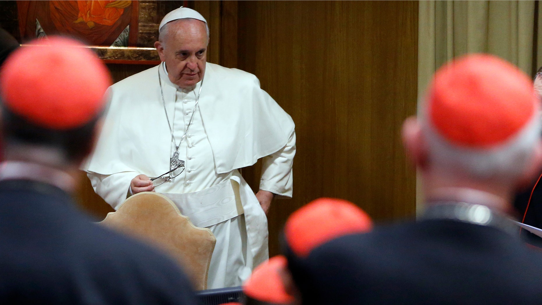 Pope Francis arrives for a consistory that was expanded to include a briefing on the situation in the Middle East, at the Vatican, Monday, Oct. 20, 2014. (AP Photo/Riccardo De Luca, Pool)