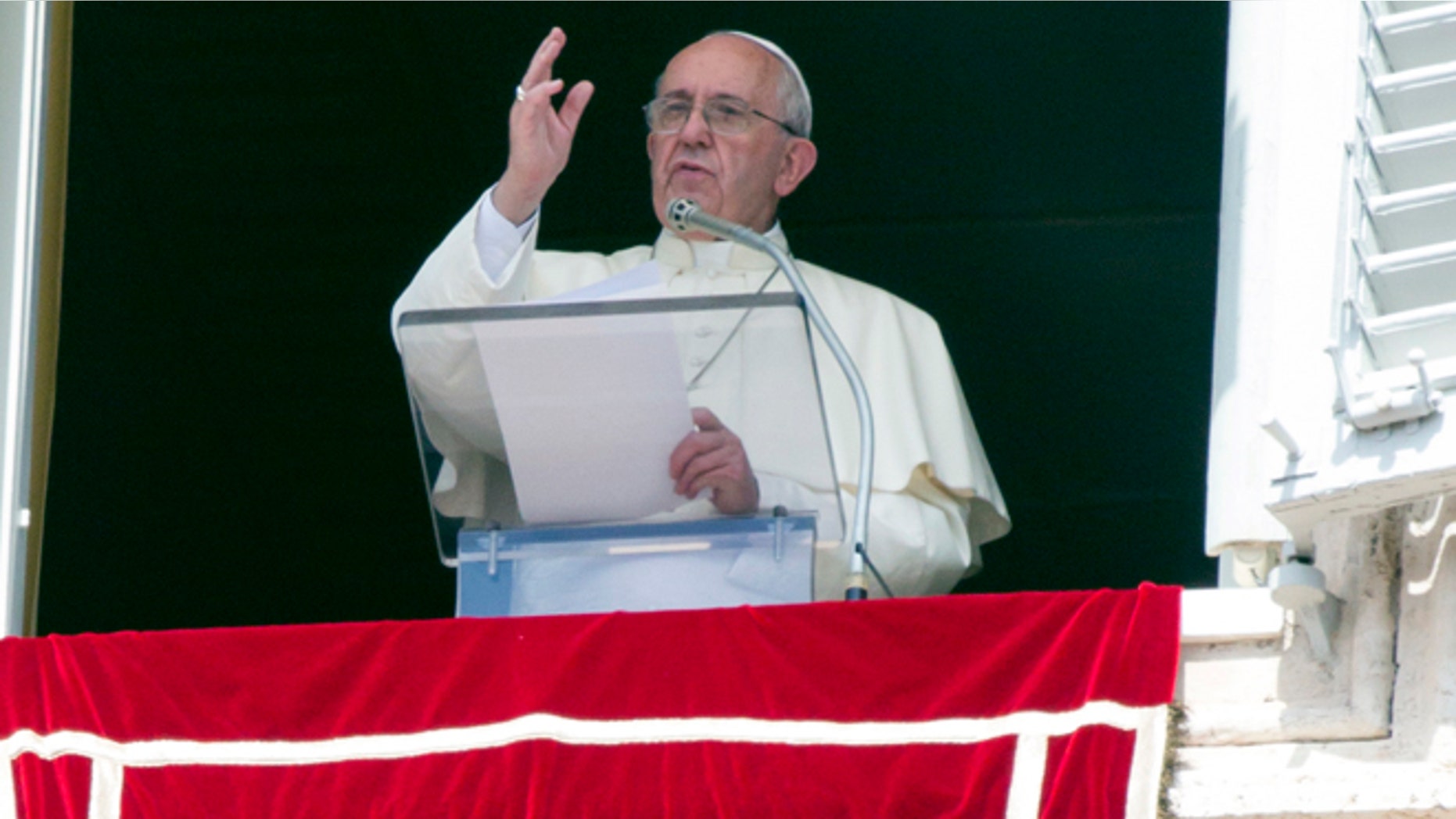 Sept. 6, 2015: Pope Francis delivers his blessing to faithful during the Angelus noon prayer from his studio window overlooking St. Peter's Square at the Vatican.