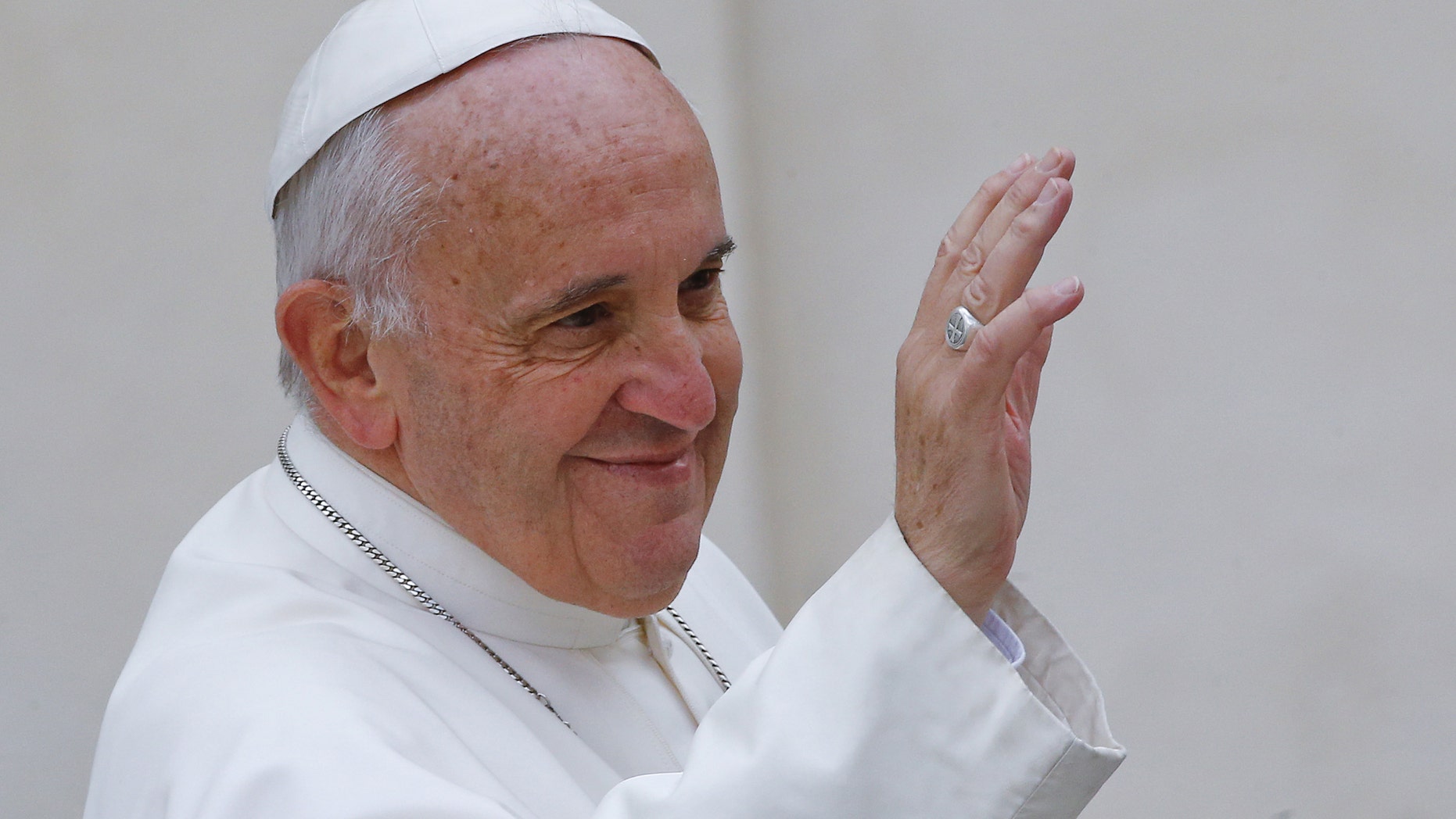 Pope Francis leaves at the end of his weekly general audience in Saint Peter's Square at the Vatican March 16, 2016. (REUTERS/Stefano Rellandini)