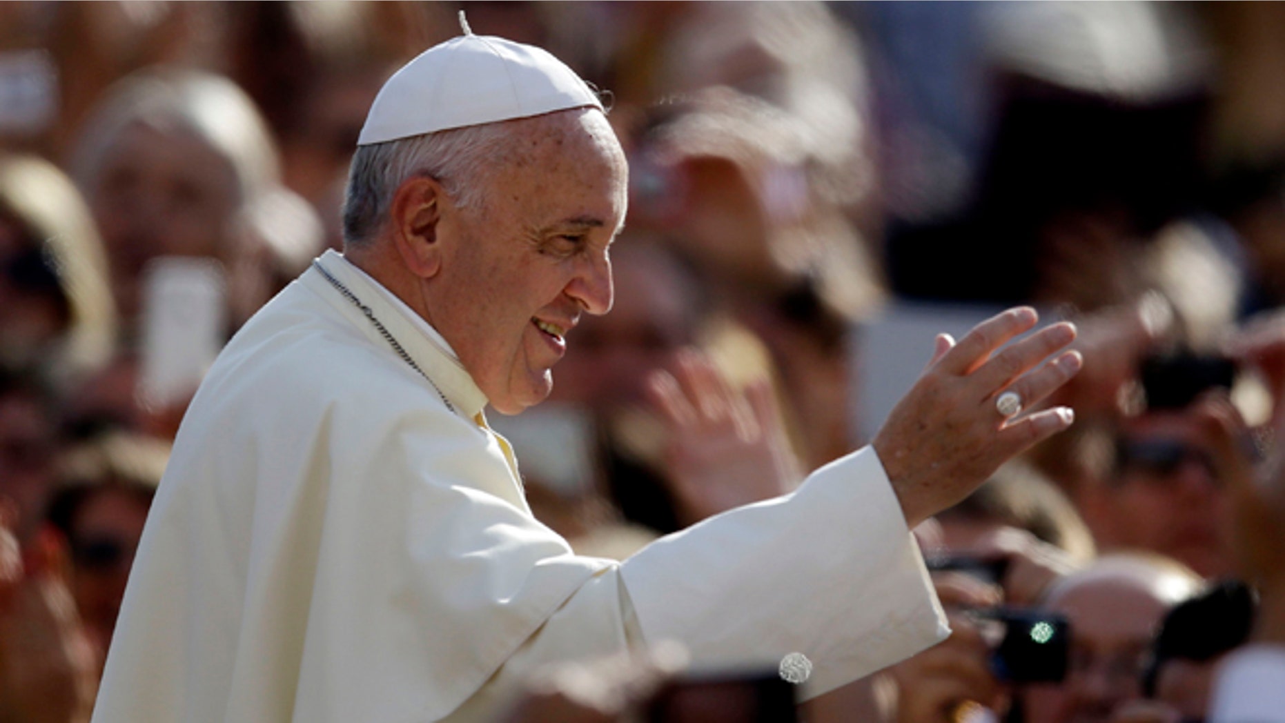 Oct. 1, 2014: Pope Francis blesses faithful upon his arrival for the weekly general audience in St. Peter's Square at the Vatican. (AP)