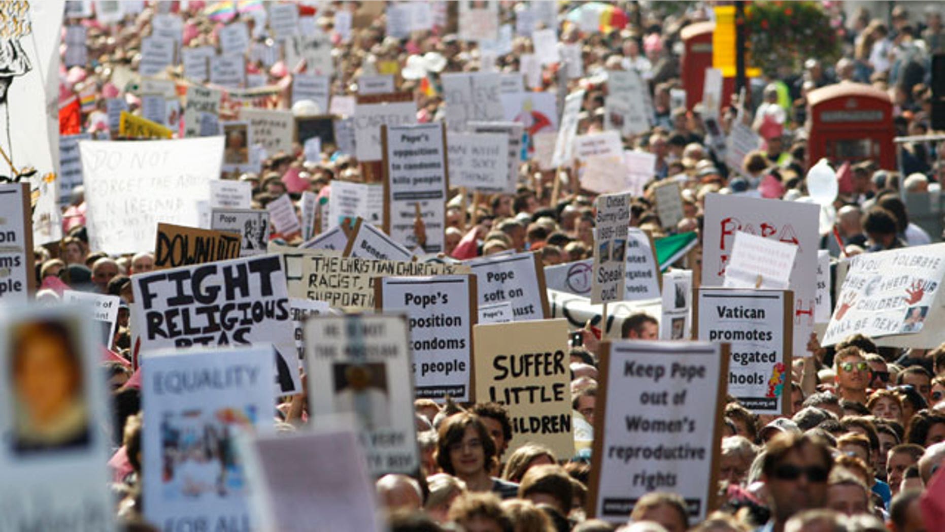Thousands of people march through central London to protest against the State visit of Pope Benedict XVI to Britain, Saturday, Sept. 18, 2010. Pope Benedict XVI is on a four-day visit, the first-ever state visit by a Pope to Britain.