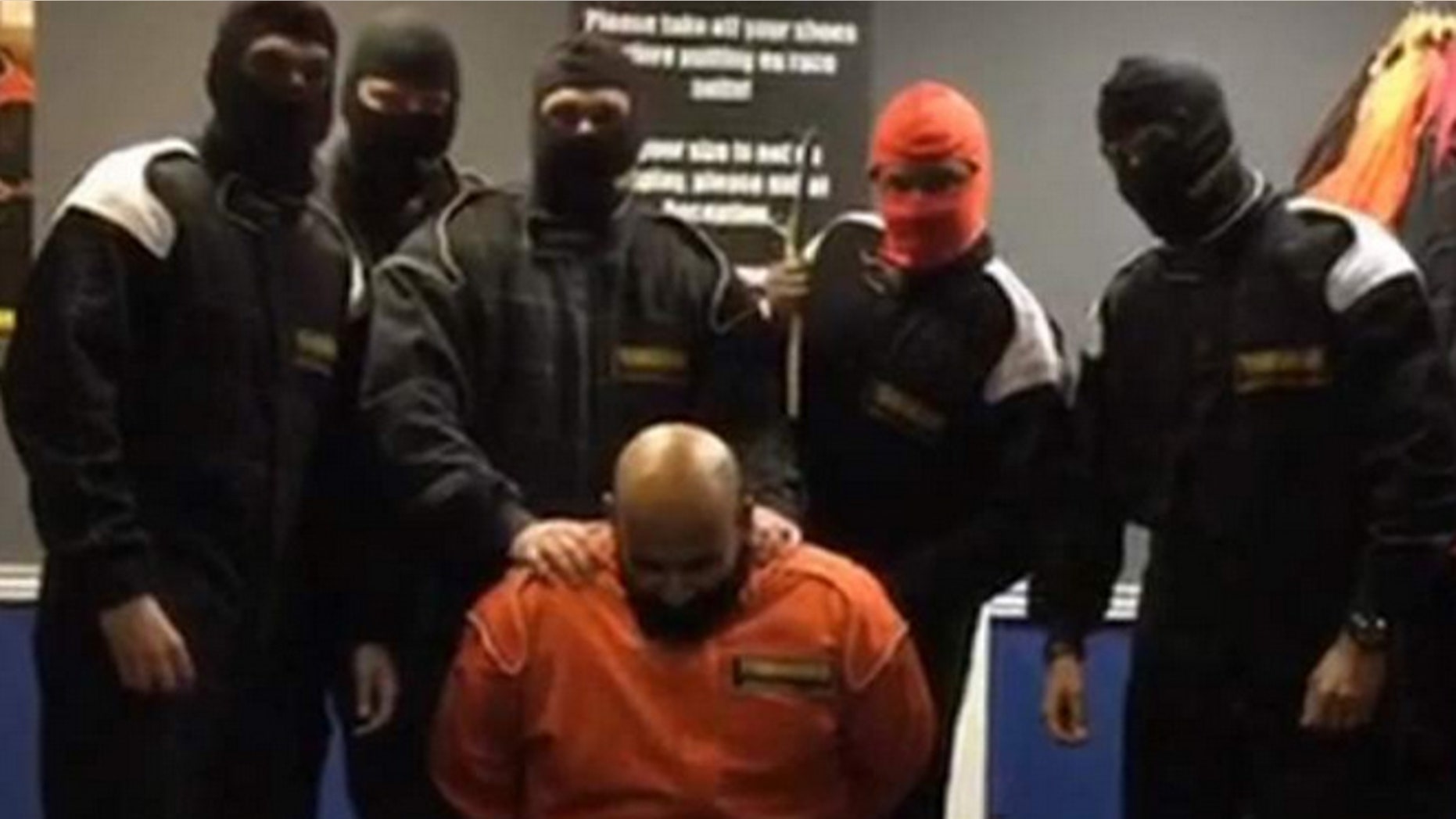 Six staff from HSBC were fired after a video appeared online showing them taking part in a mock Islamic State style killing.