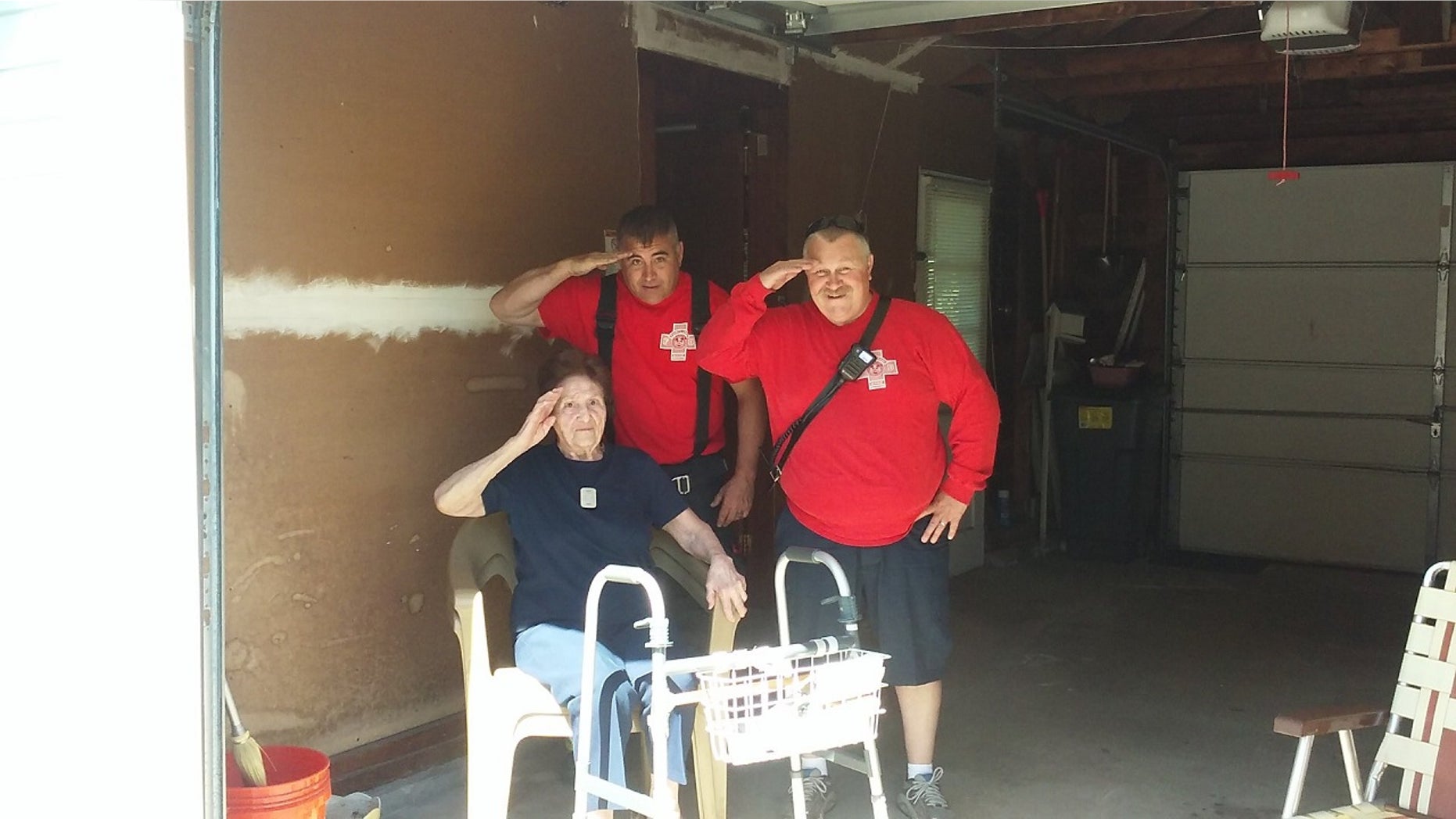 Firefighters in Maine took time on Tuesday to assist a 97-year-old woman with a patriotic task.