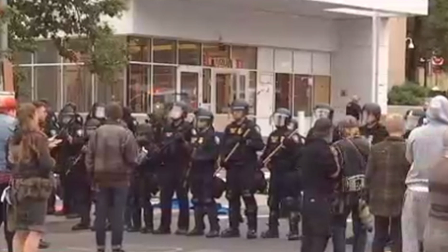 Homeland Security police officers are trying to re-open Thursday an ICE facility in Portland, Ore., that was shut down by protesters.