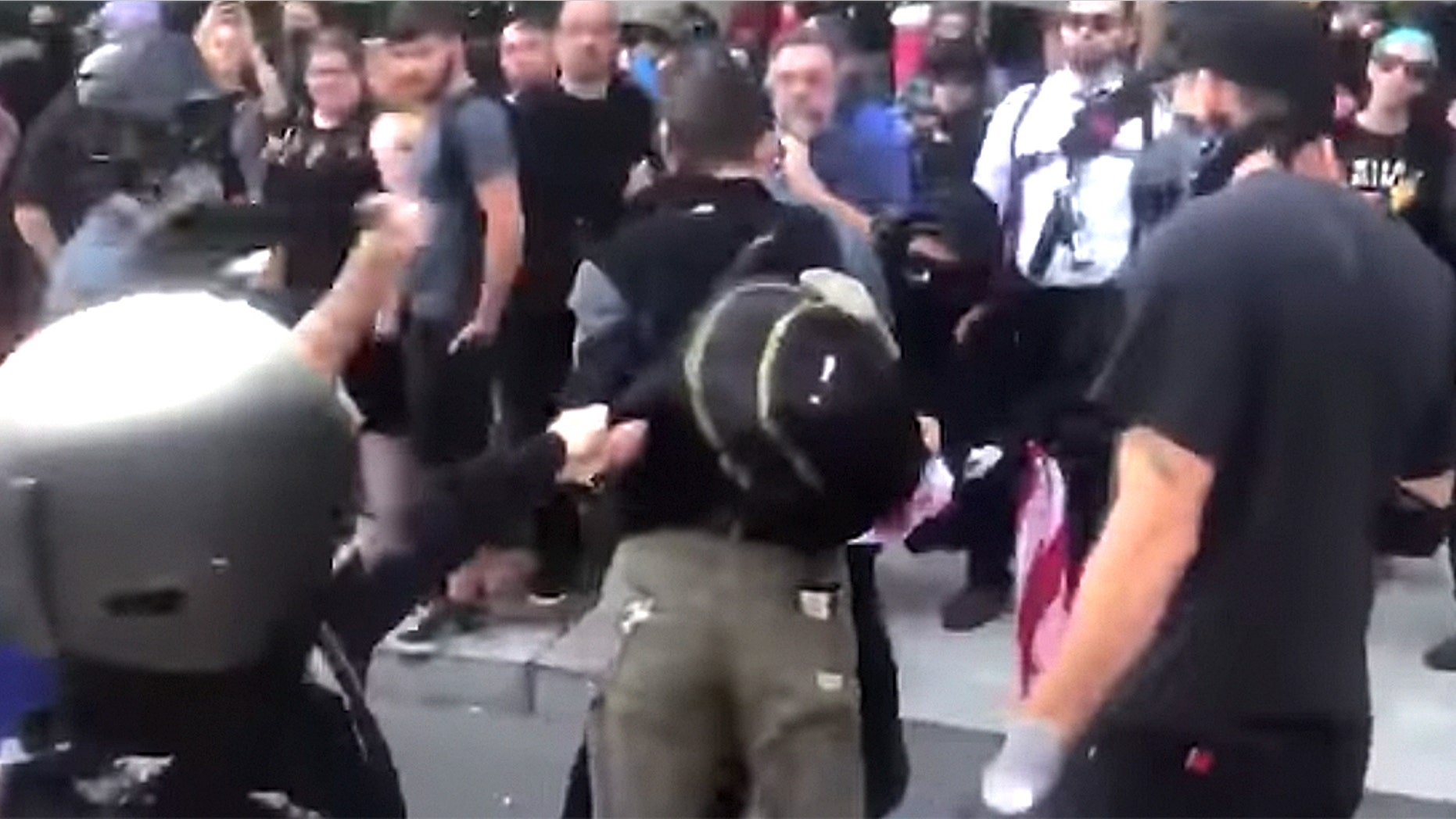 Paul Welch was beaten by Antifa members for carrying an American flag at an counter-protest in Portland, Oregon.