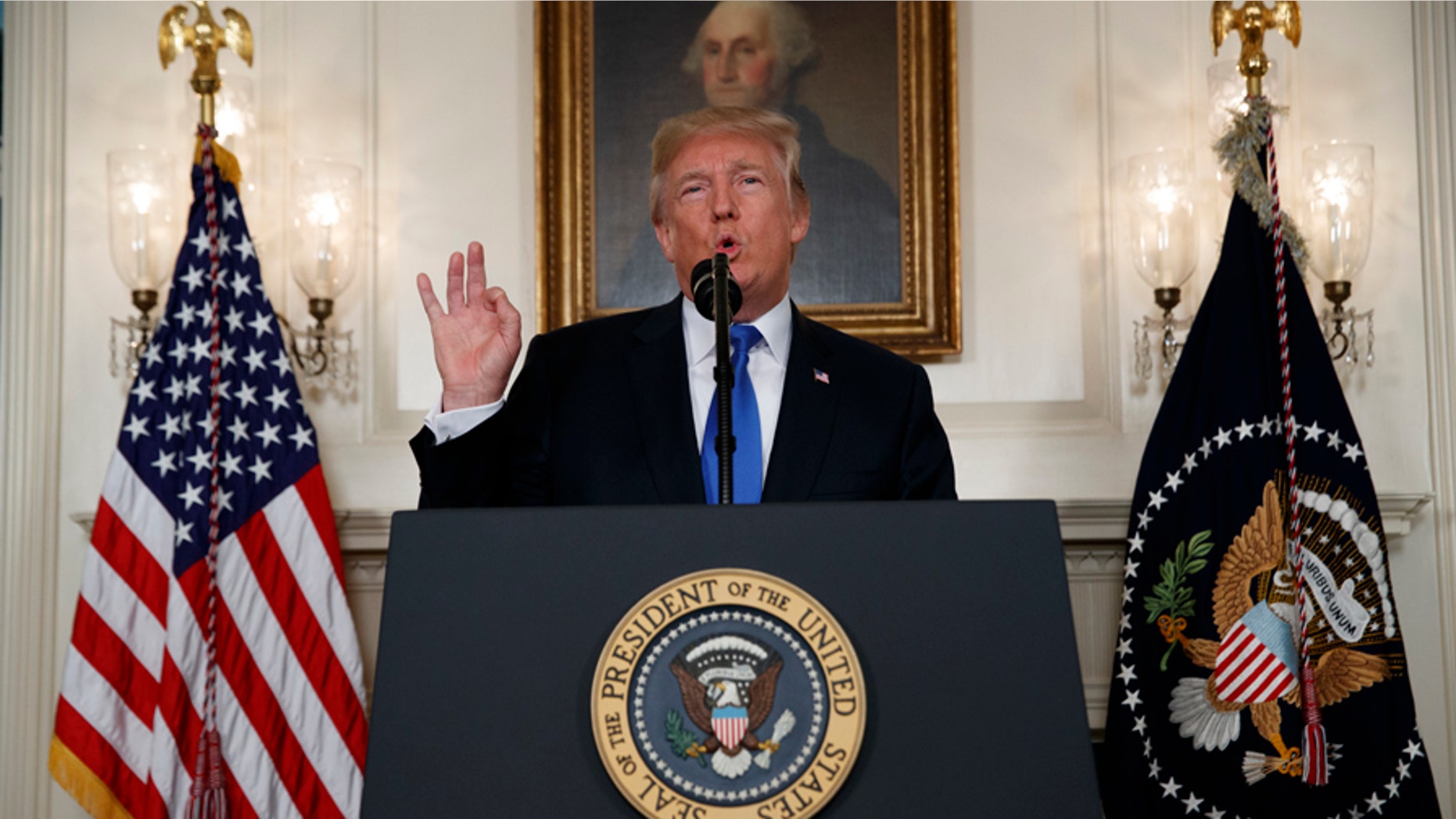 A judge recommended Thursday that President Donald Trump mute rather than block some of his critics from following him on Twitter to resolve a First Amendment lawsuit. ((AP Photo/Evan Vucci)