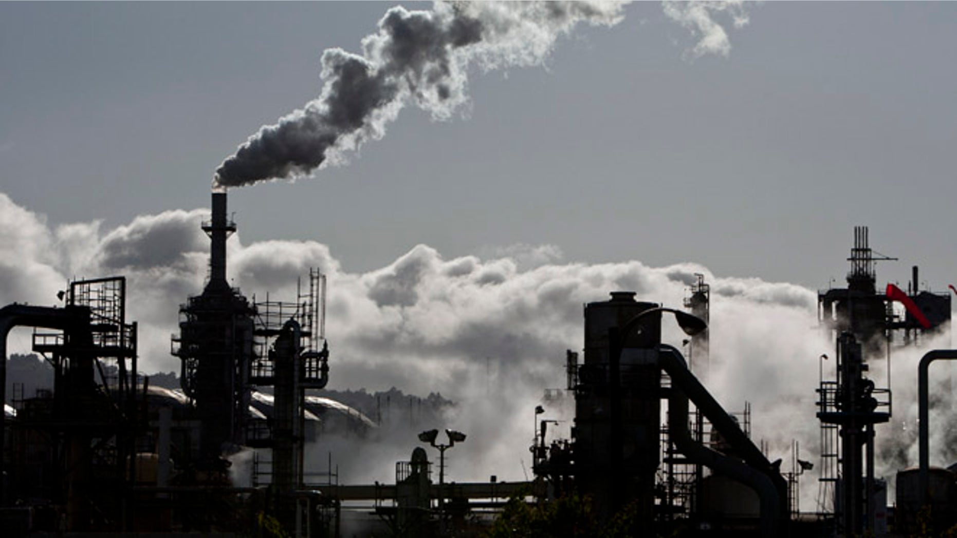 March 24, 2012: Smoke is released into the sky at the ConocoPhillips oil refinery in San Pedro, Calif.