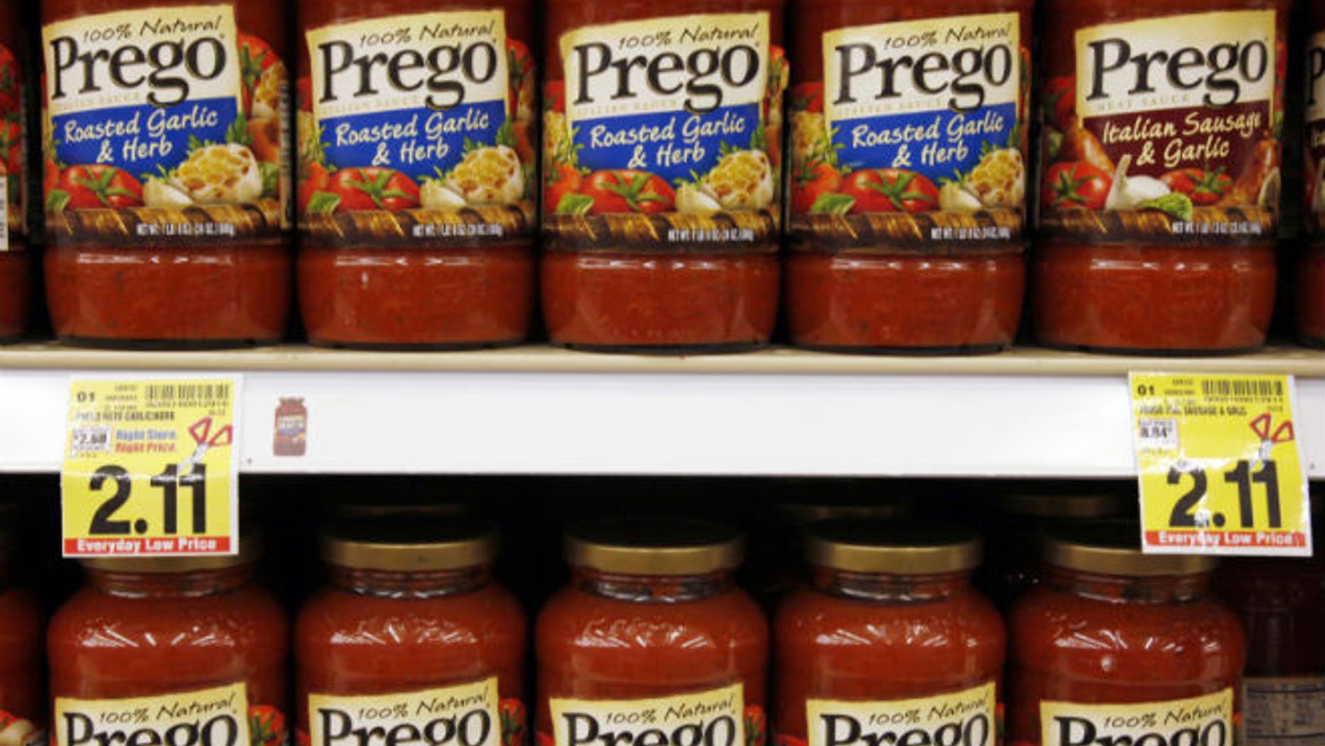 Jars of Prego sauce on a grocery store shelf (Reuters/Rick Wilking)
