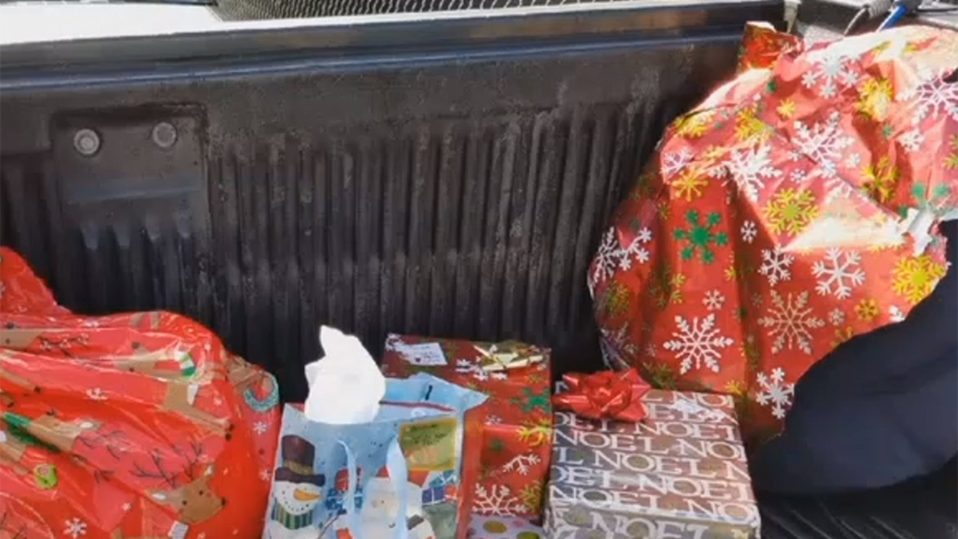 A woman spotted Christmas presents on the side of a Florida highway and wants to return them to the owner.