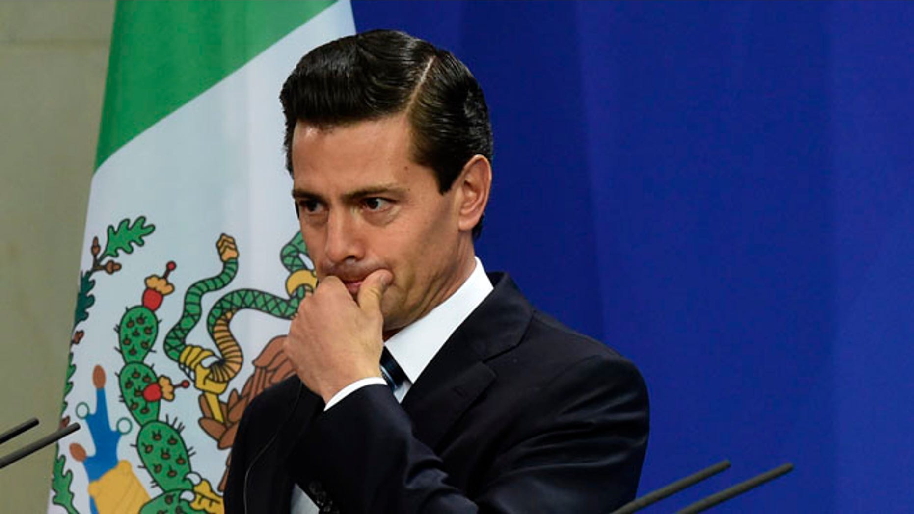 German Chancellor Angela Merkel and Mexican President Enrique Pena Nieto give a news conference following talks at the Chancellery in Berlin on April 12, 2016. / AFP / TOBIAS SCHWARZ (Photo credit should read TOBIAS SCHWARZ/AFP/Getty Images)
