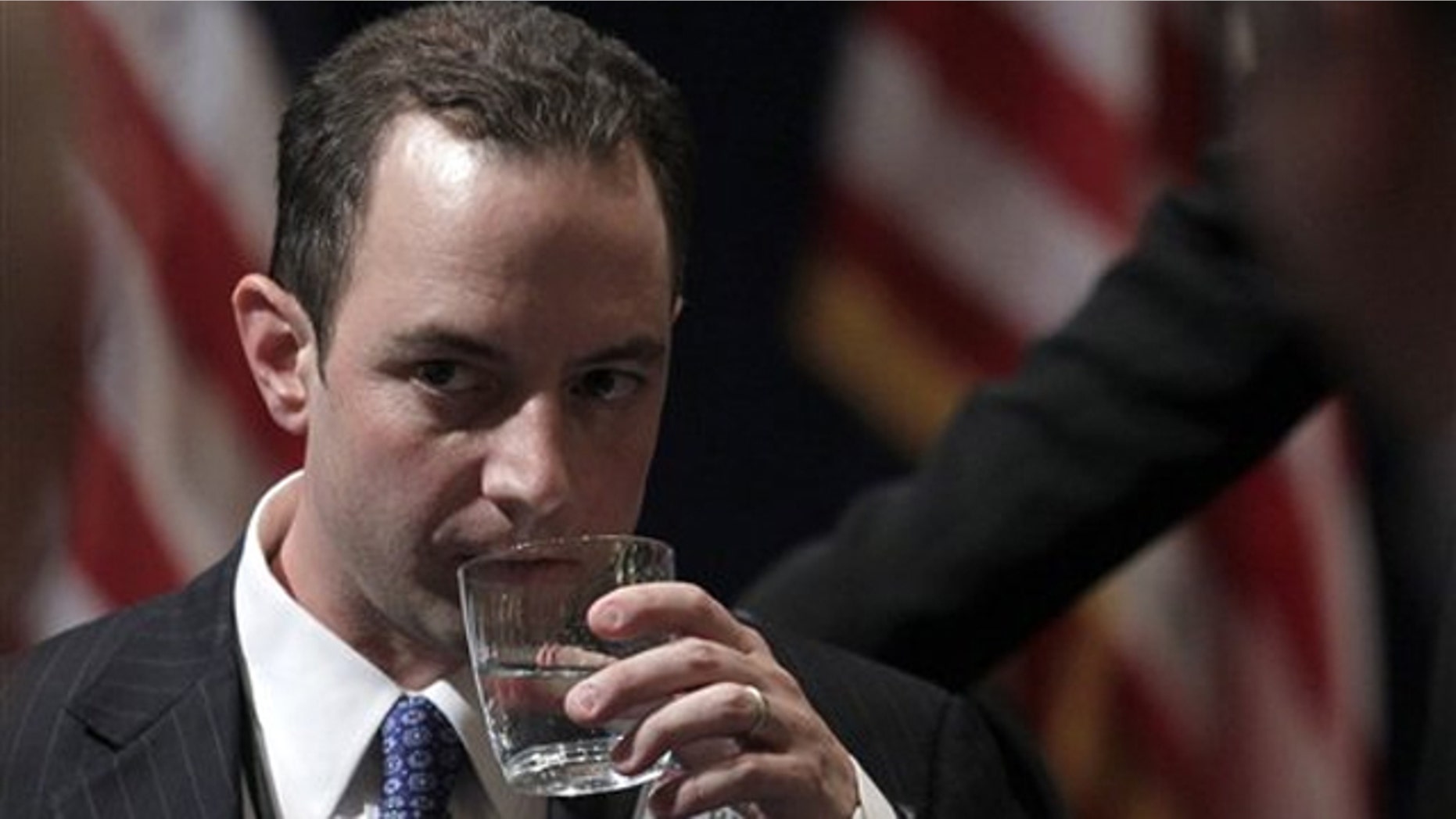 Reince Priebus takes a drink of water after winning the chairmanship during the Republican National Committee Winter Meeting Jan. 14 in Oxon Hill, Md.