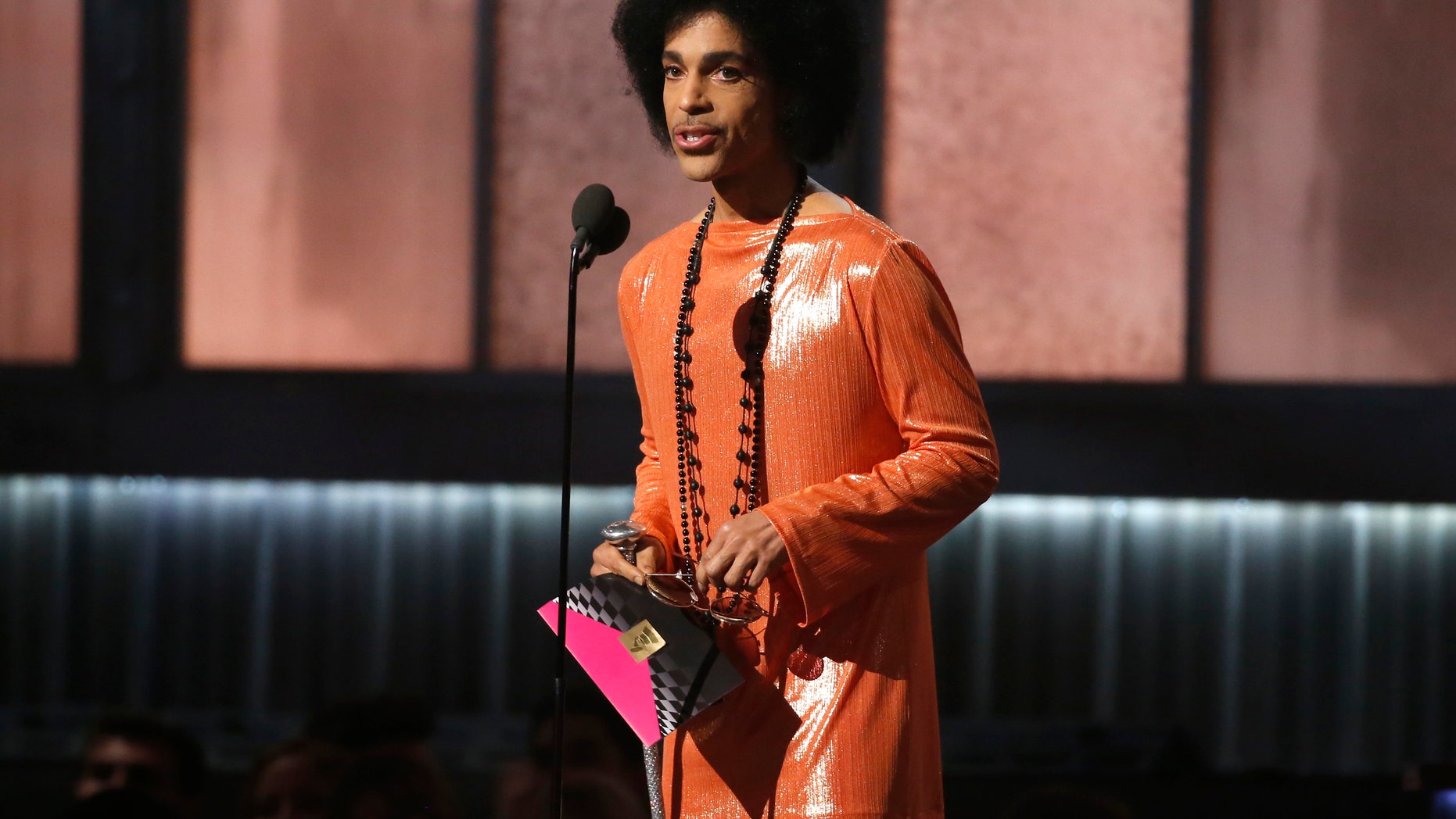 February 8, 2015. Prince presents the award for album of the year at the 57th annual Grammy Awards in Los Angeles, California.