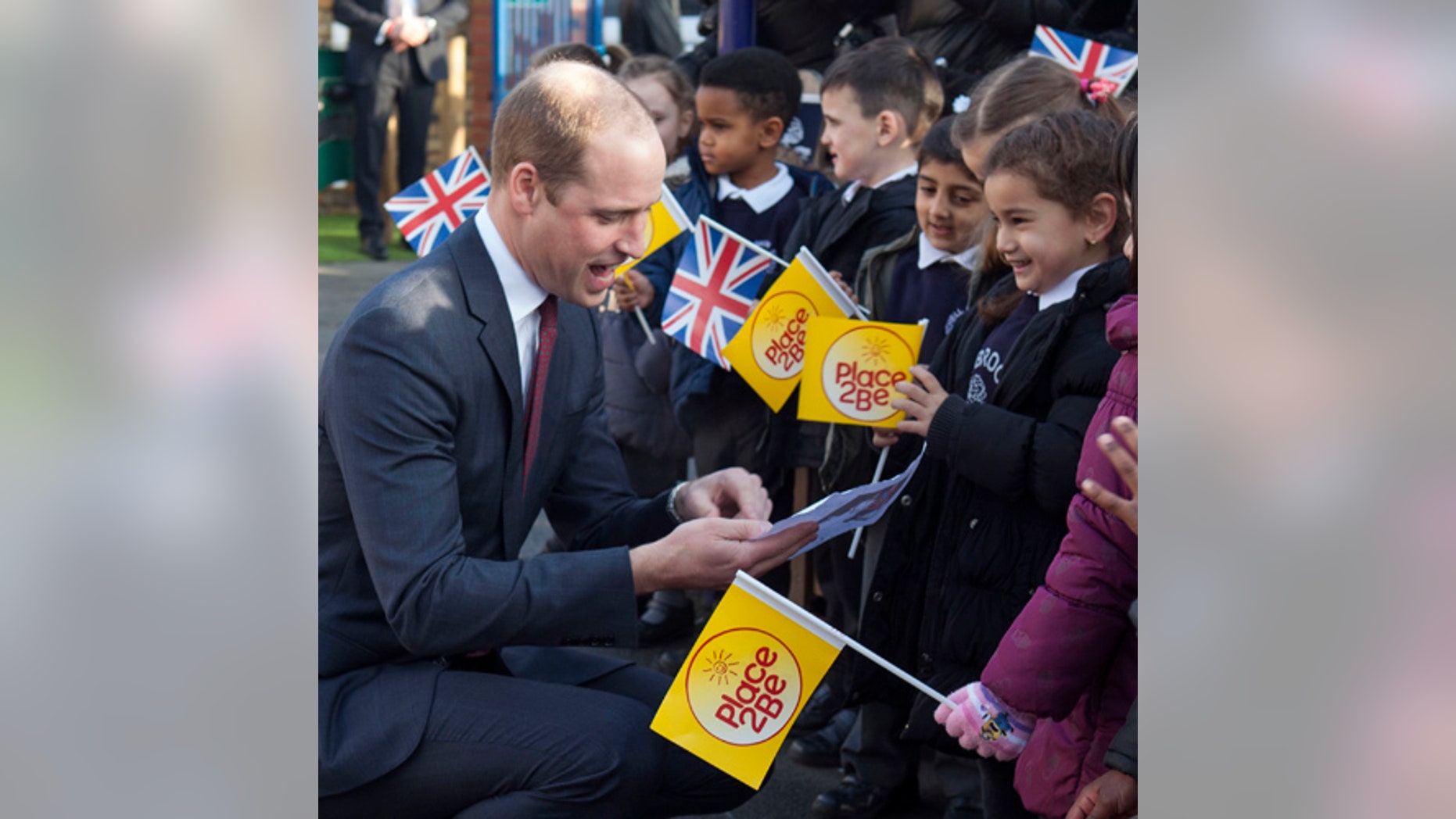 Britain's Prince William arrives with his wife Kate, Duchess of Cambridge to attend the Place2Be Big Assembly as part of the Heads Together campaign marking children's mental health week at the Mitchell Brook Primary School, north London, Monday Feb. 6, 2017. (Ian Vogler/Pool via AP)