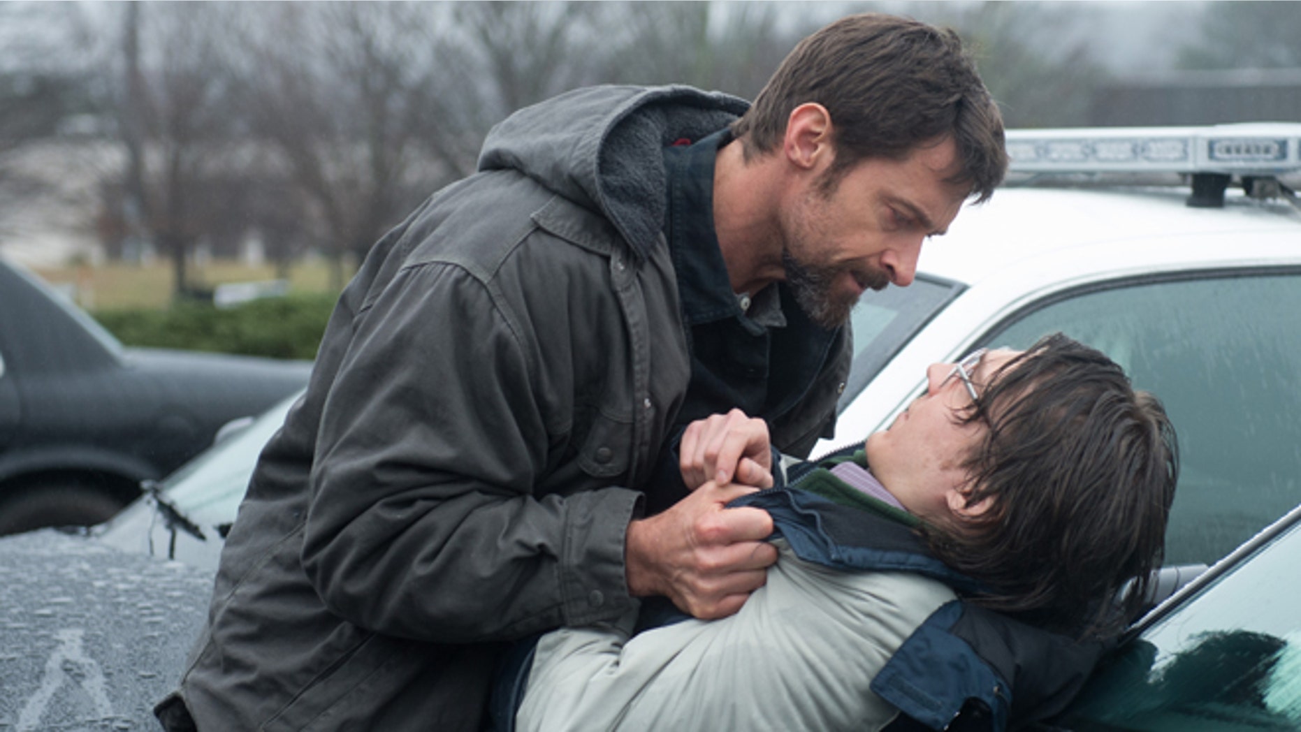 This image released by Warner Bros. Pictures shows Hugh Jackman, left, and Paul Dano in a scene from "Prisoners."