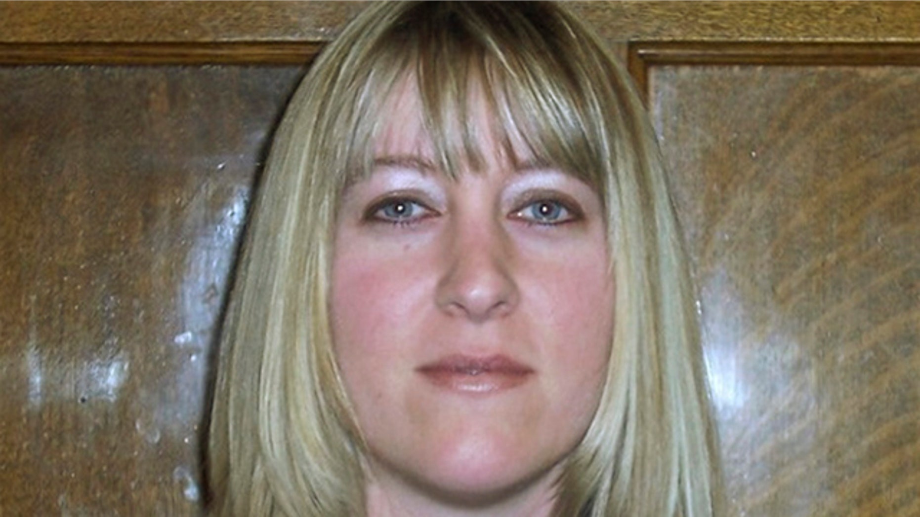 In this undated photo provided by the Washington State Department of Corrections, Corrections Officer Jayme Biendl is shown. Biendl was found strangled Saturday, Jan. 29, 2011, at the Monroe Correctional Complex in Monroe, Wash.
