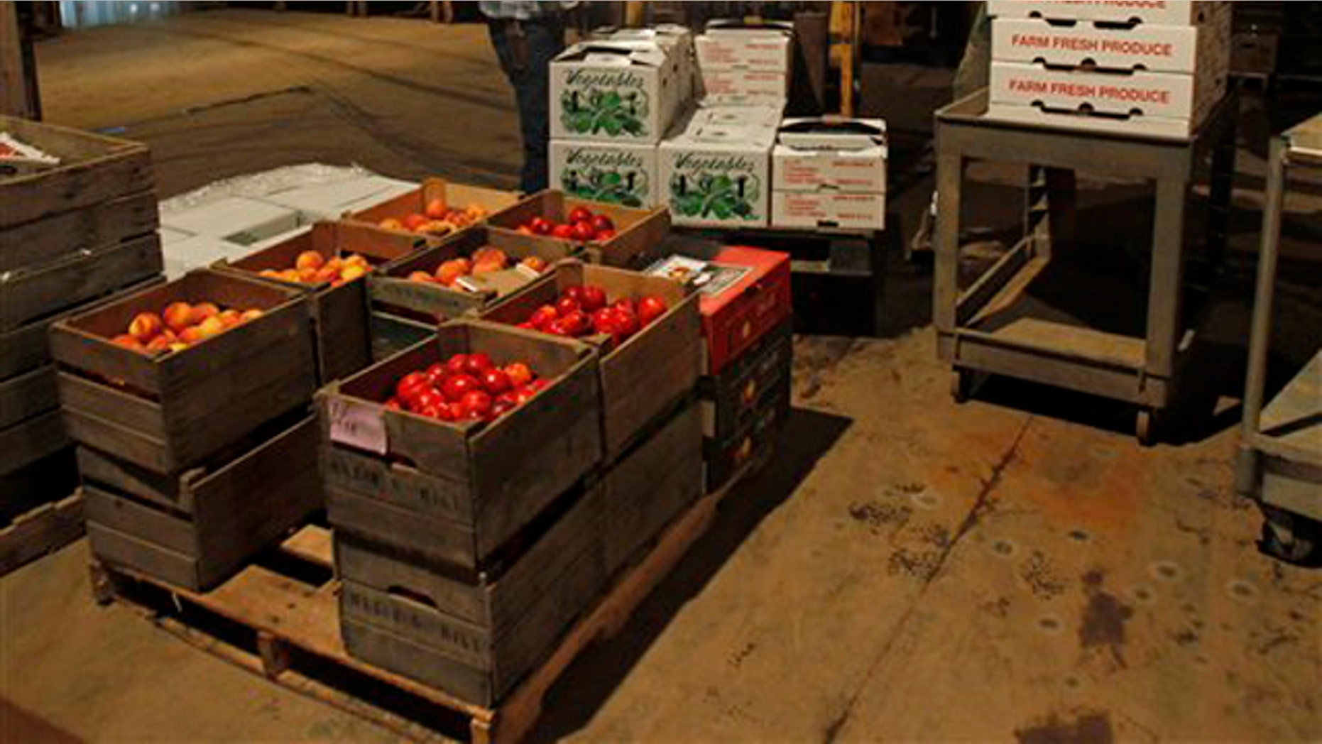 Shown here are produce cartons bound for families in New York City at Schoharie Valley Farms in Schoharie, N.Y., on July 21. (AP Photo)