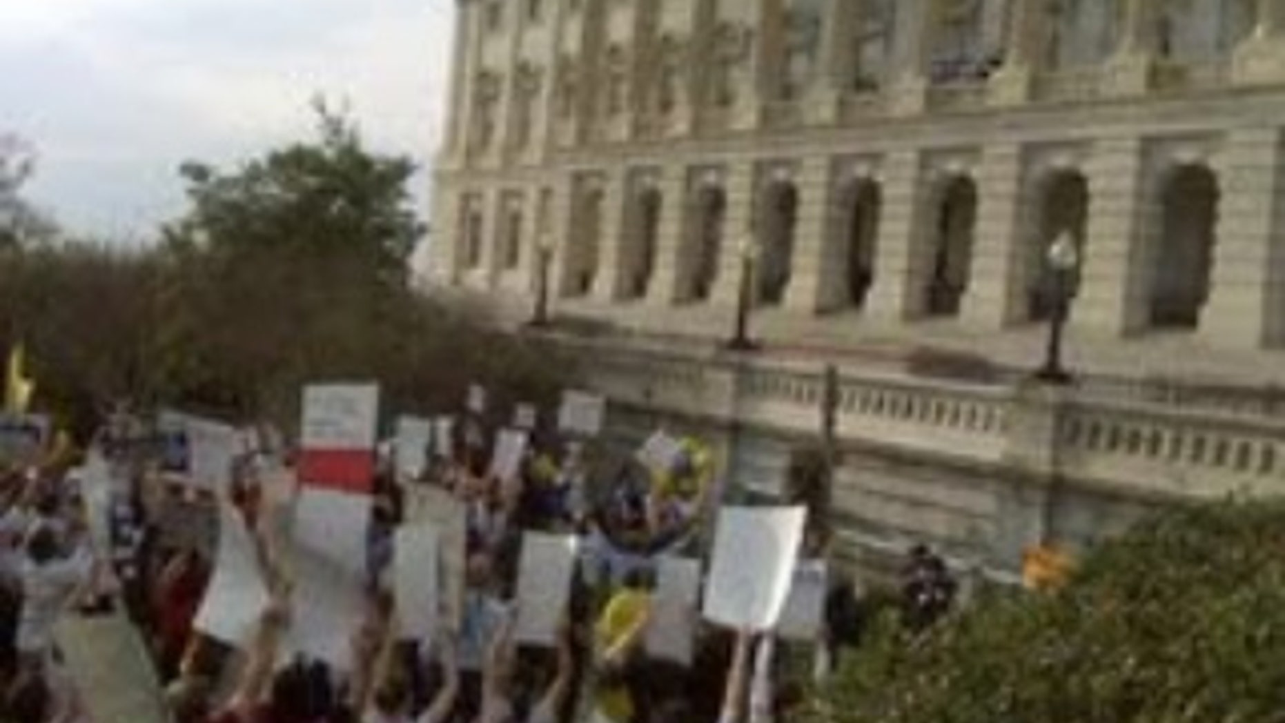 Pro-Health Care Reform and Anti-Health Care Reform Protestors Rally in front of the Capitol