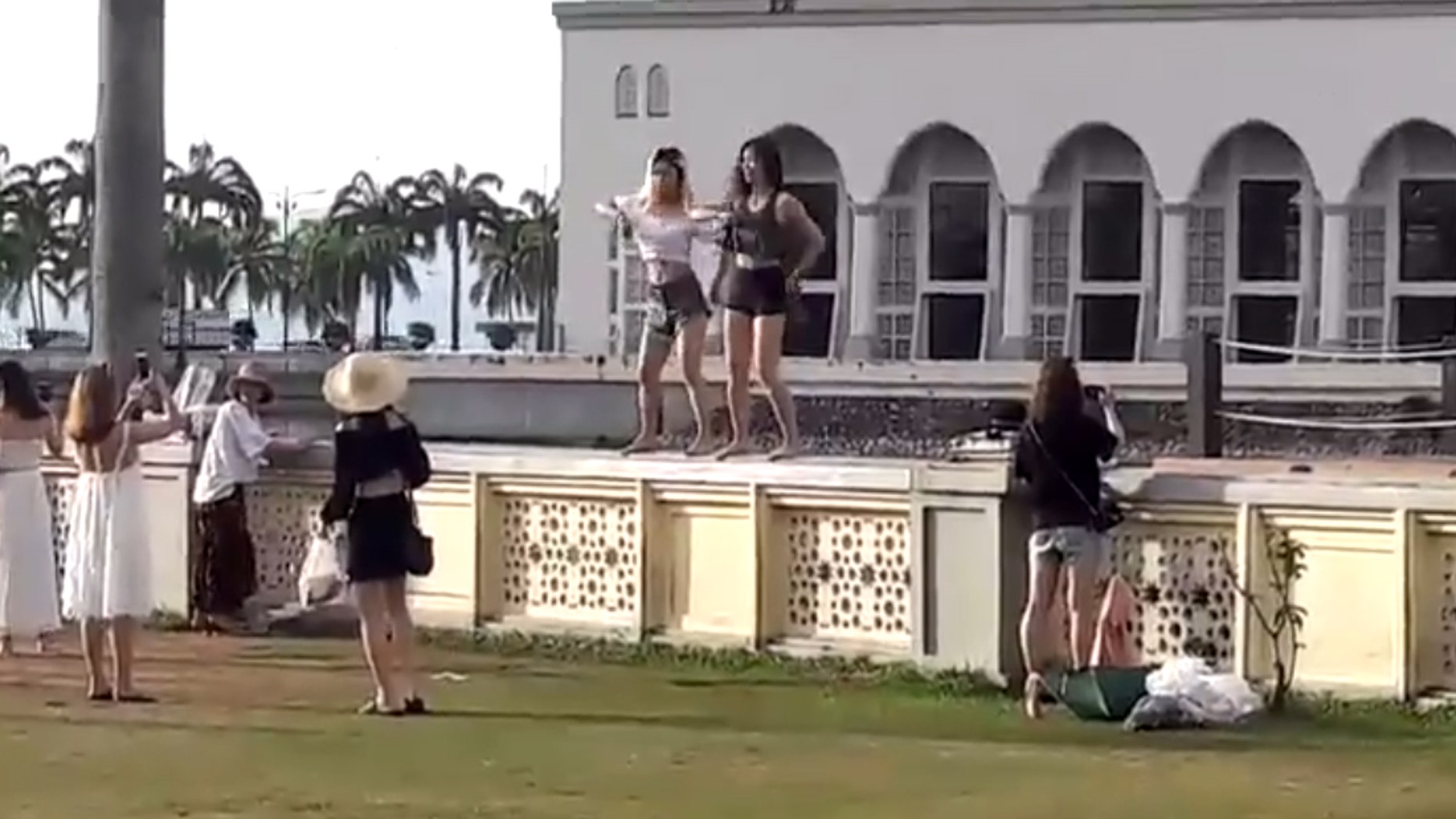 The mosque's chairman said the ladies' actions has "tarnished the image of our religion."