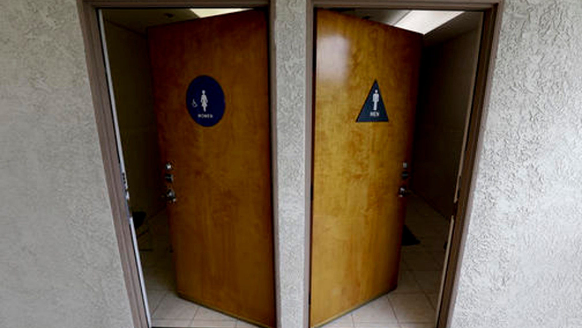 The doors to public restrooms are propped open at a office complex on Monday, May 9, 2016 in Anaheim, Calif.
