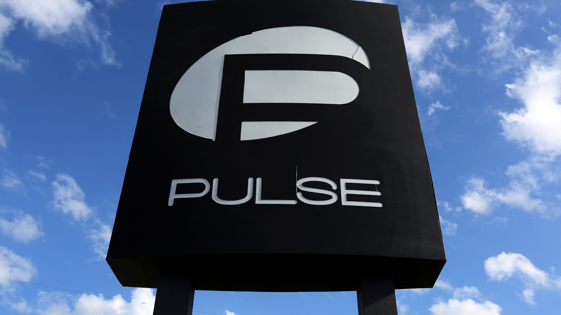 The Pulse nightclub sign is pictured following the mass shooting last week in Orlando, Florida, U.S. on June 21, 2016. REUTERS/Carlo Allegri/File Photo - RTSL995