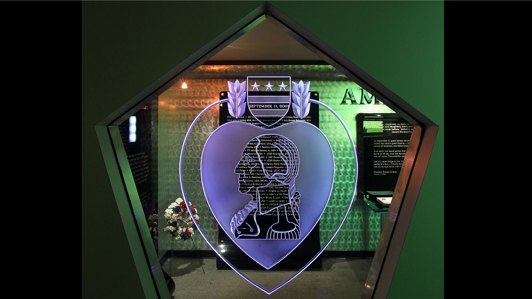 A window display features a Purple Heart at the Memorial Chapel of the Pentagon.