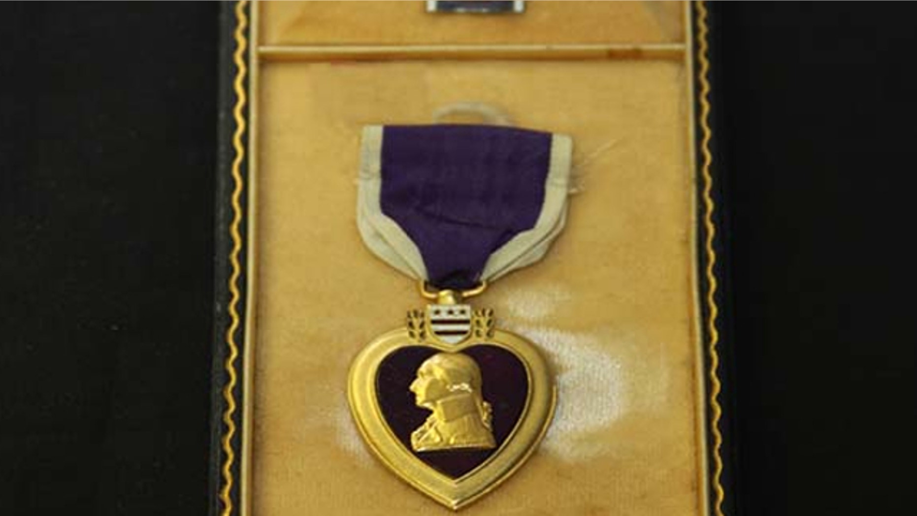 UNDATED: This Purple Heart medal is one of more than 120 military medals, badges and other insignia awaiting return in Missouri.