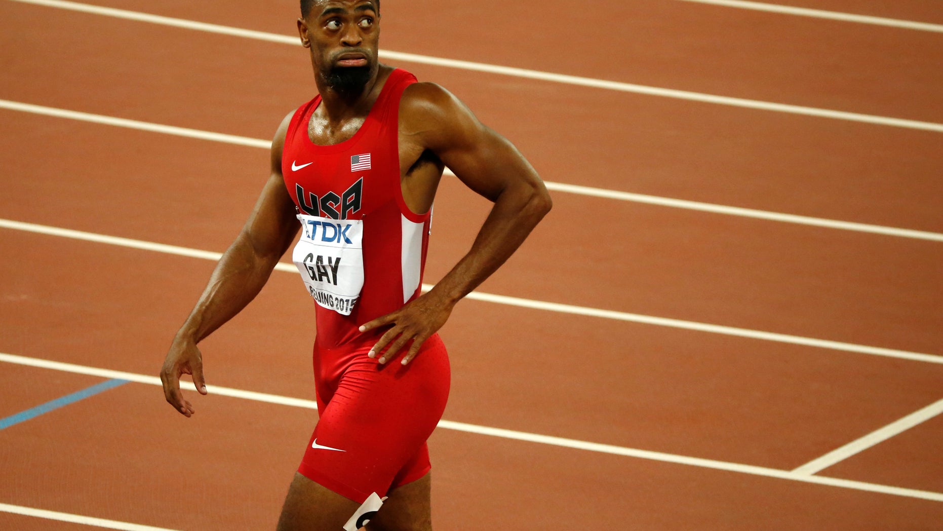 Tyson Gay leaves the track after an events at the World Athletics Championships in 2015.