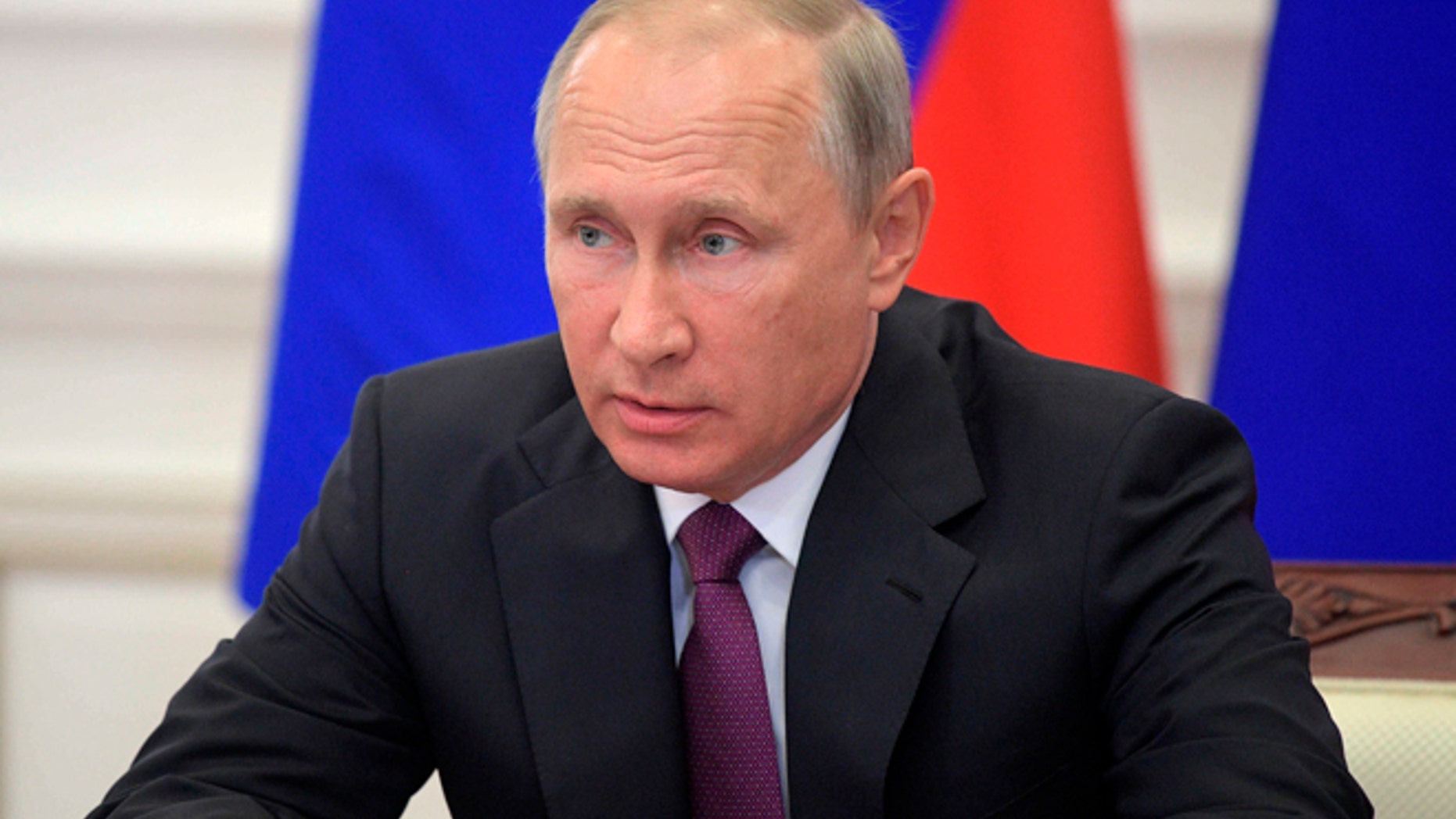 Russian President Vladimir Putin chairs a meeting on the development of transport infrastructure in Kaliningrad, Russia, Wednesday, Aug. 16, 2017. (Alexei Druzhinin, Sputnik/Kremlin Pool Photo via AP)