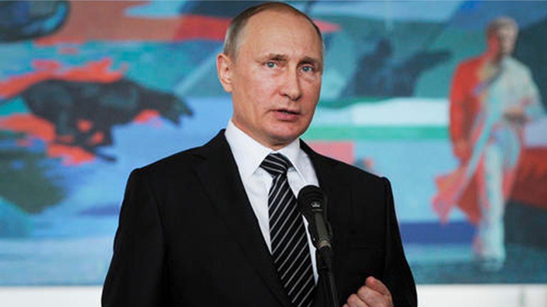 Russian President Vladimir Putin gestures while speaking during a news conference in Bishkek, Kyrgyzstan, Saturday. (Mikhail Klimentyev/Sputnik, Kremlin Pool Photo via AP)