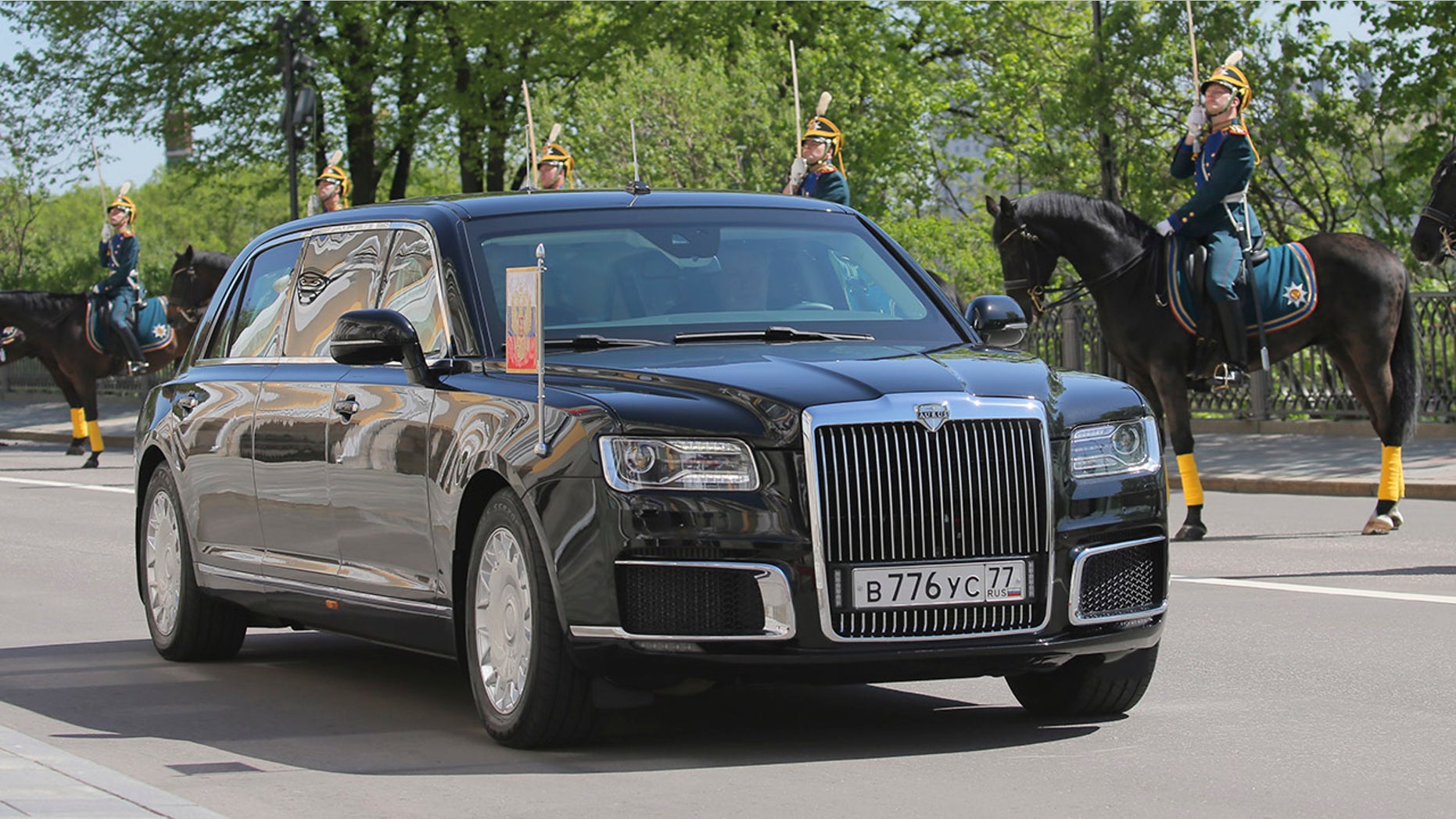 One of Russiaâs new Presidential limousine is driven during the inauguration ceremony of Vladimir Putin, in Moscow, Russia, Monday, May 7, 2018. Putin took the oath of office for his fourth term as Russian president on Monday and promised to pursue an economic agenda that would boost living standards across the country. (Sergei Savostyanov, Sputnik, Kremlin Pool Photo via AP)