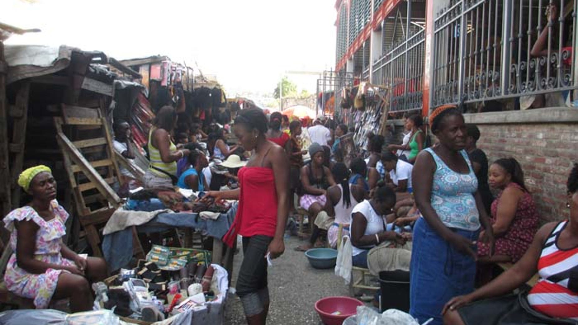 Haitians gather in the capital's downtown, where signs of economic life have begun to appear. (FoxNews.com)