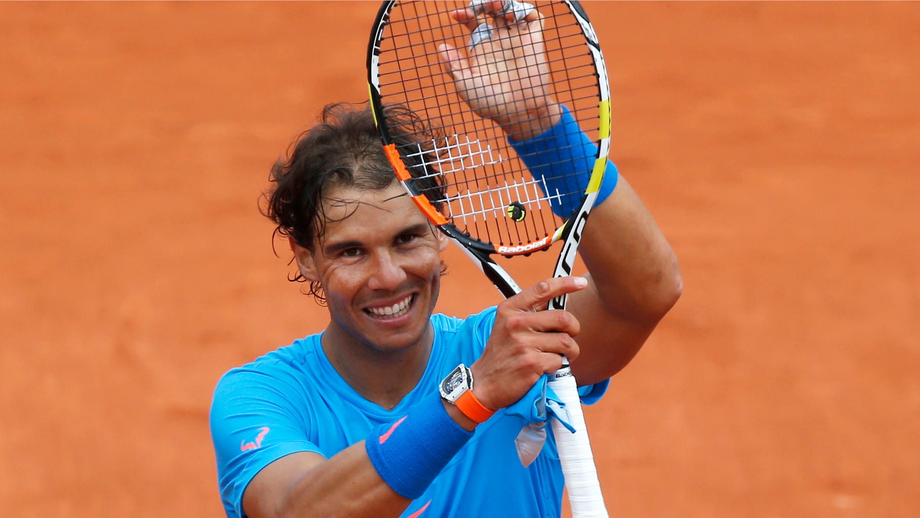 Nadal celebrates at the Roland Garros stadium, in Paris, France, Tuesday, May 26, 2015.