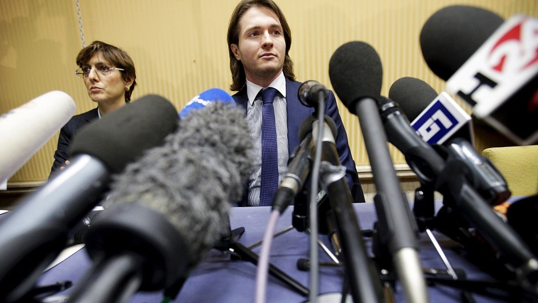Raffaele Sollecito with his lawyer Giulia Bongiorno during a news conference in 2015.