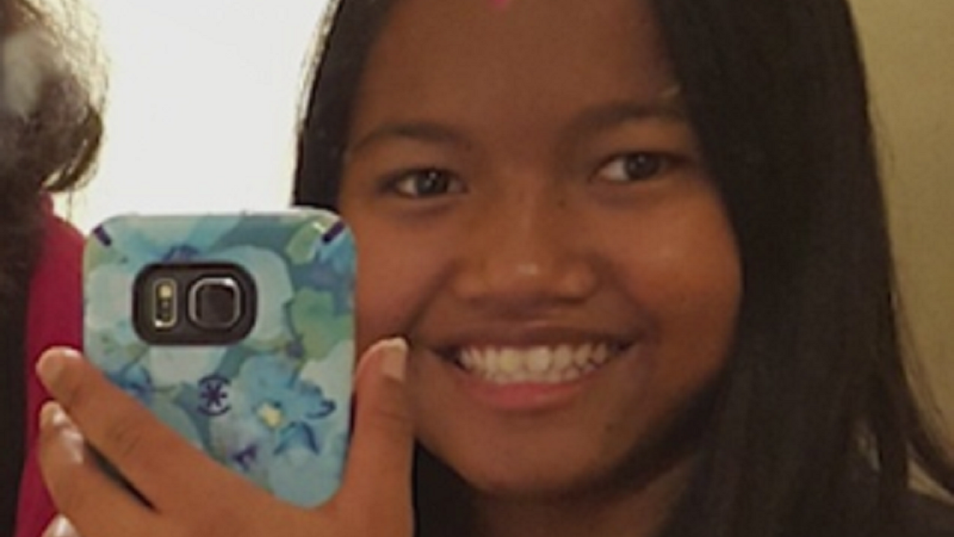 H'Money Siu, 16, slipped over a waterfall in North Carolina while trying to save her 11-year-old sister Wednesday.