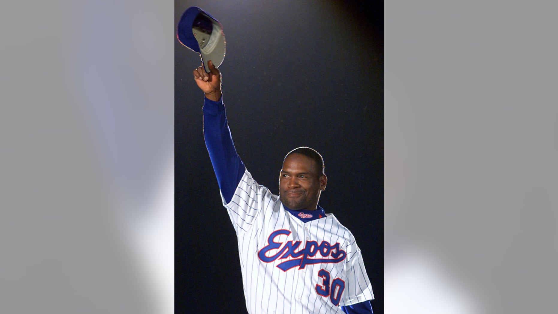 April 6, 2001: Tim Raines acknowledges applause from fans as he is presented before the Montreal Expos' home opener.