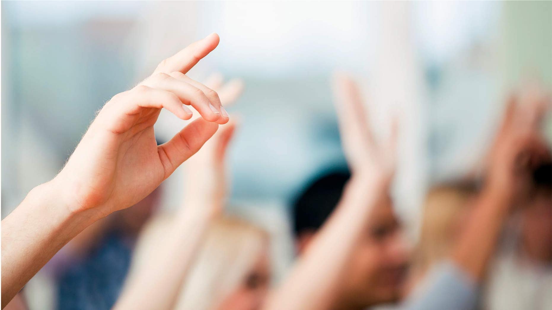 raising hand to ask question