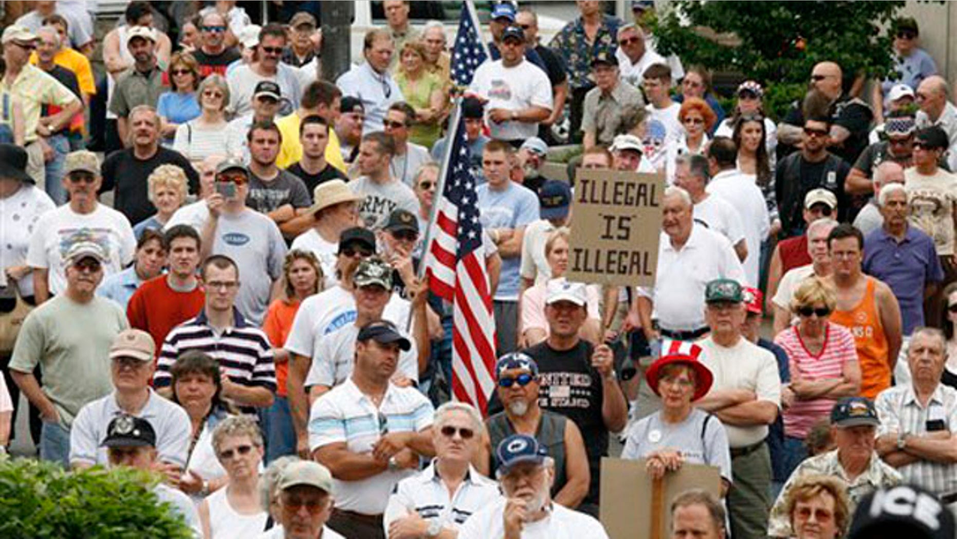 In this June 3, 2007, file photo, a crowd gathers during a rally in support of Hazleton Mayor Lou Barletta in front of City Hall in Hazleton, Pa. (AP Photo)