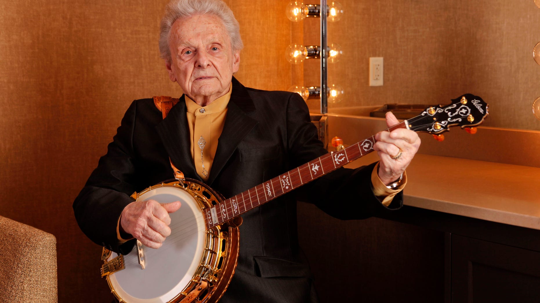 March 11, 2011. Ralph Stanley poses for a photo backstage at the Grand Ole Opry House in Nashville, Tenn.