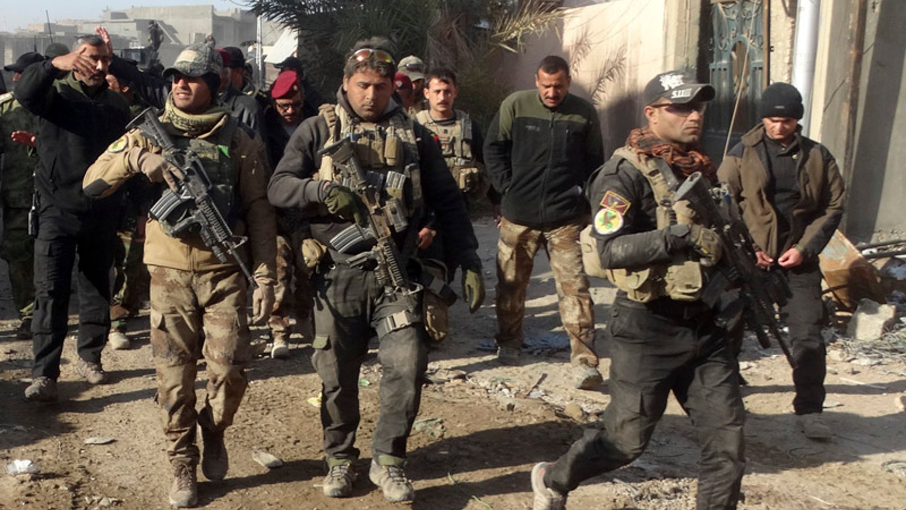 Dec. 28, 2015: Iraqi security forces enter the government complex in central Ramadi, 70 miles west of Baghdad, Iraq. (AP)