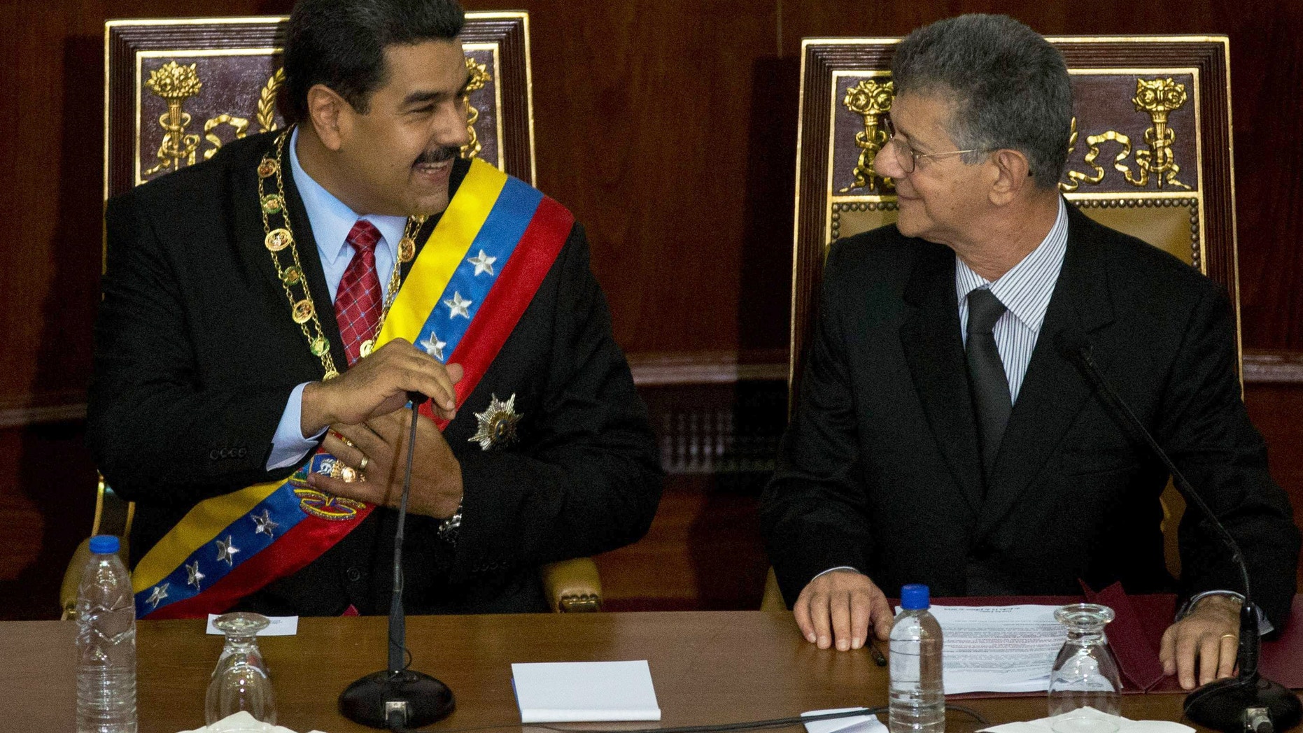 Maduro and Ramos prior to the annual state of the nation report in Caracas, Venezuela, Friday, Jan. 15, 2016.