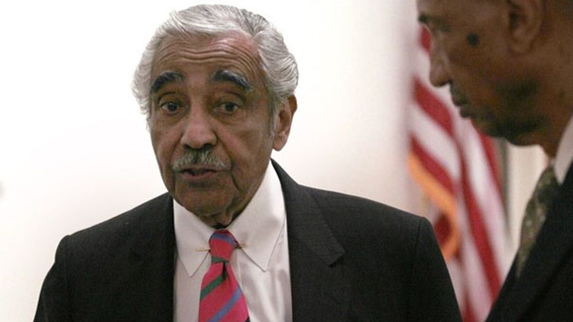July 22, 2010: U.S. Rep. Charles Rangel speaks with Chief of Staff George Henry shortly after a congressional investigative panel accused Rangel of ethics violations. (Reuters)