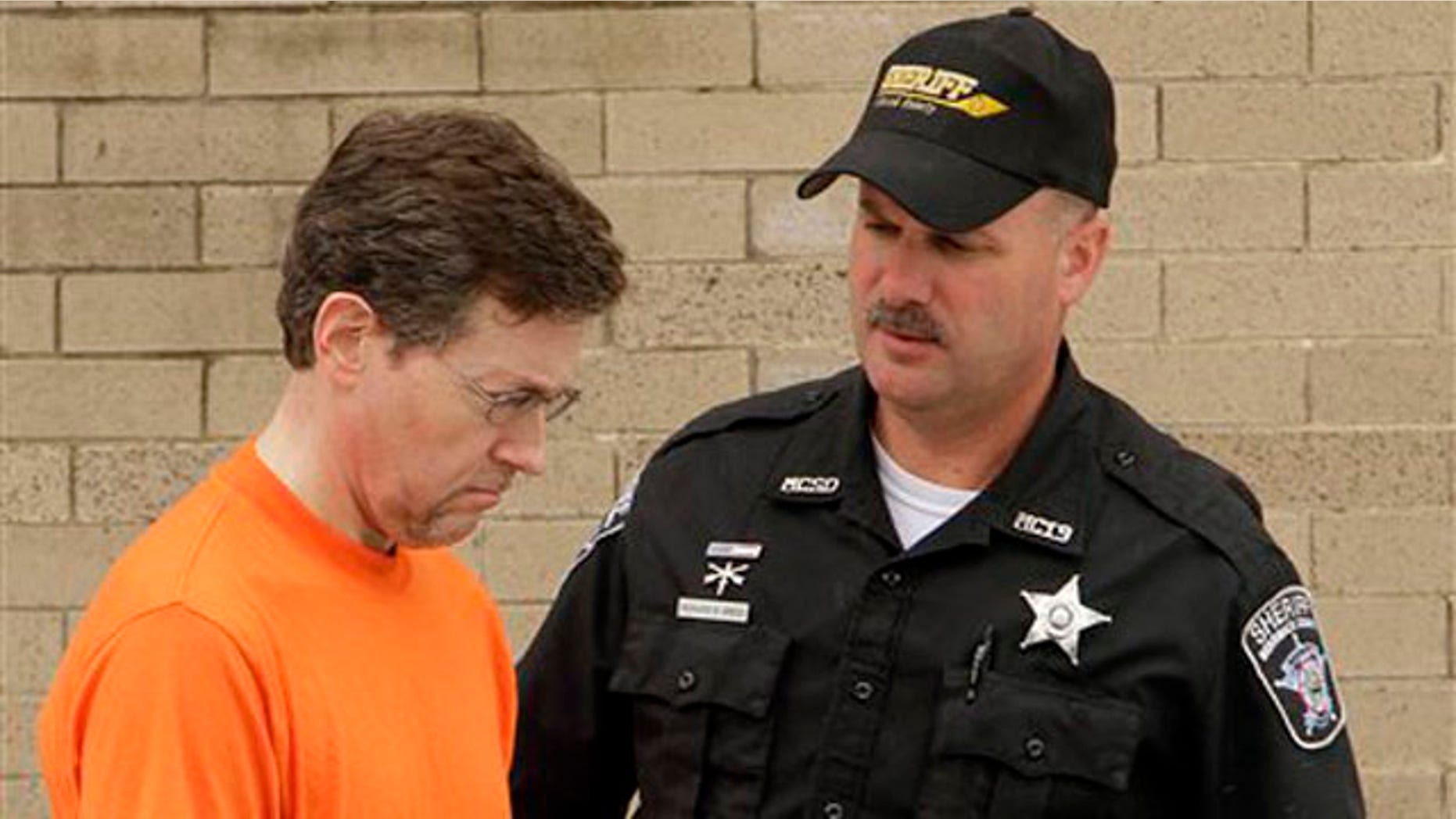 Ernest Willis is escorted out of the Merrimack County Superior Courthouse, Tuesday, Sept. 6, 2011 in Concord, N.H. Willis was convicted of raping and impregnating a 15-year-old church member, who was made to apologize to her fellow member.