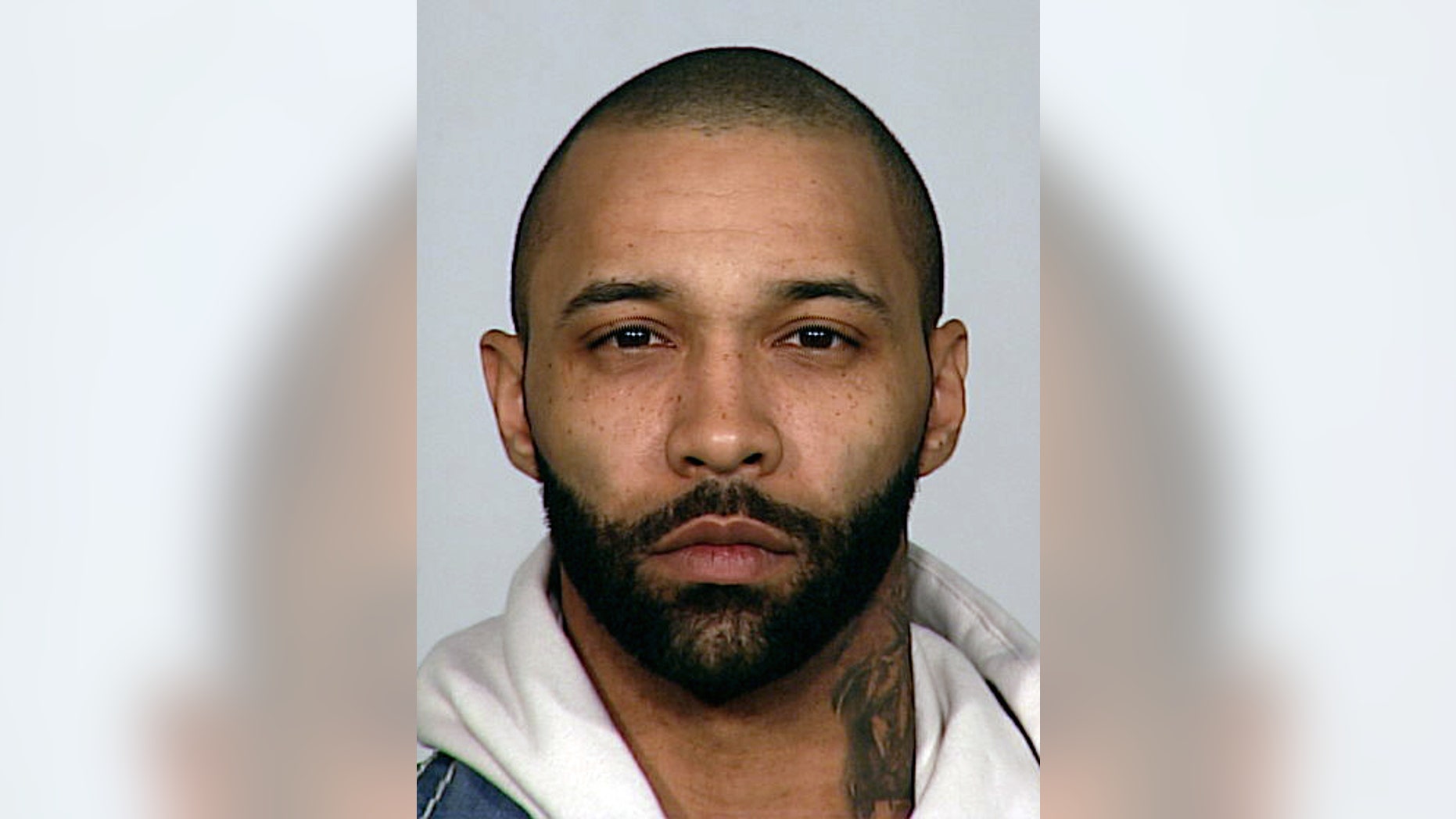 In this undated photo provided by the New York City Police Department, rapper and reality show star Joe Budden is shown.