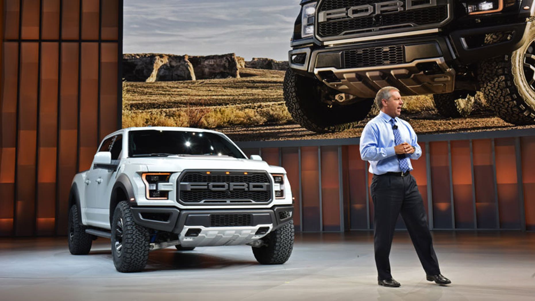 Ford President of the Americas, Joe Hinrichs, and the 2017 Ford F-150 Raptor SuperCrew