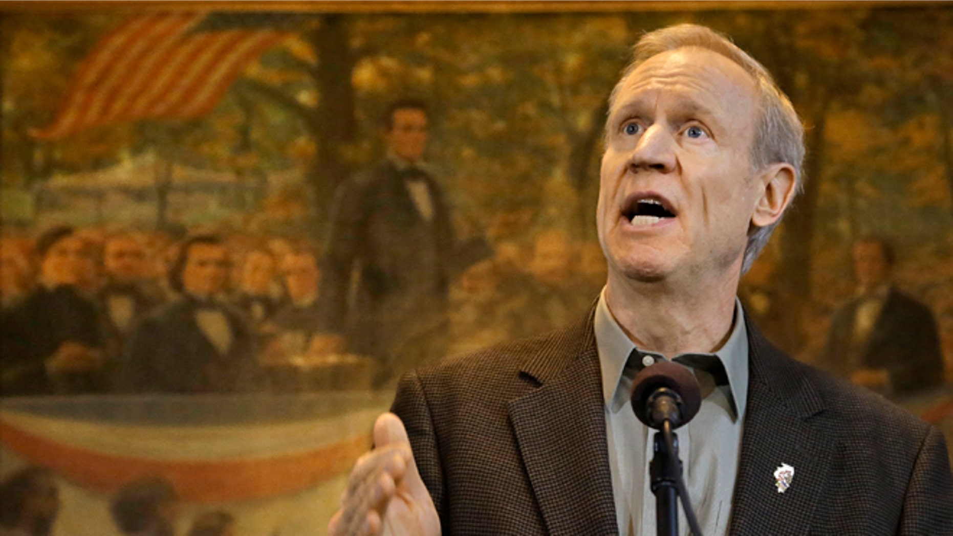 Feb. 9, 2015: Illinois Gov. Bruce Rauner speaks to reporters during a news conference in his office at the Illinois State Capitol in Springfield, Ill.