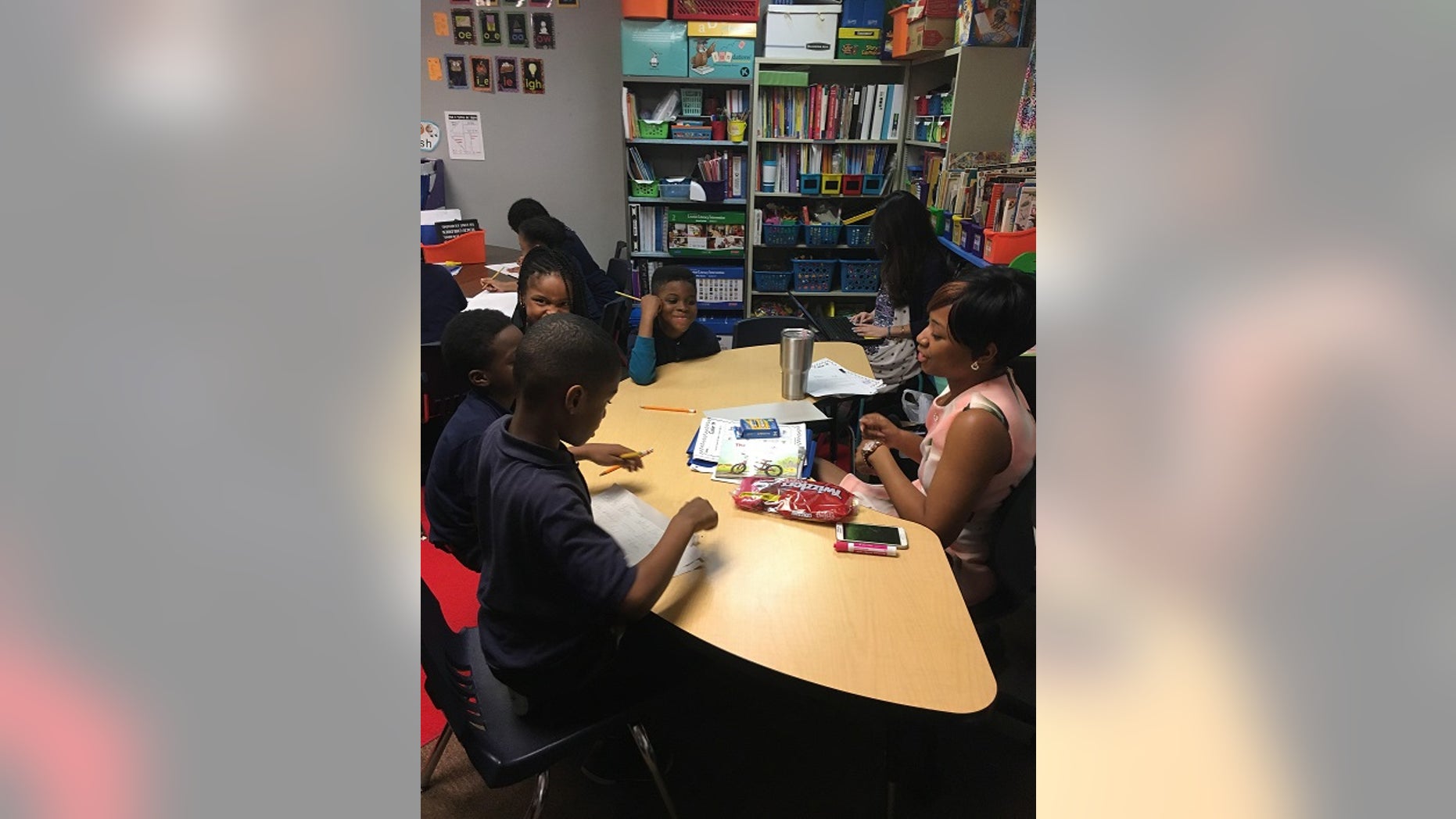 18-year-old Raven Osborne teaching elementary school children at 21st Century Charter School in Gary, Indiana on April 25, 2017.