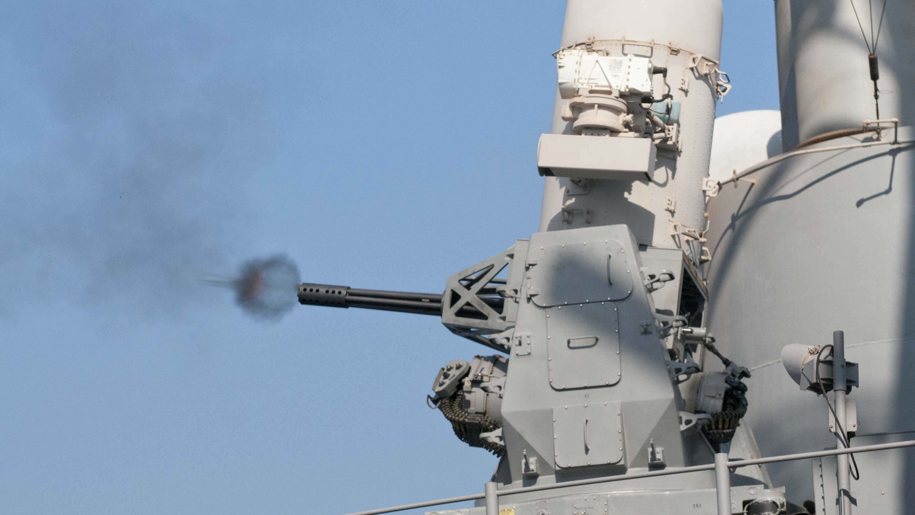 File photo - The guided-missile cruiser USS Hue City conducts a live-fire test of its Phalanx close-in weapons system (CIWS). (U.S. Navy photo by Mass Communication Specialist Seaman Darien G. Kenney/Released)