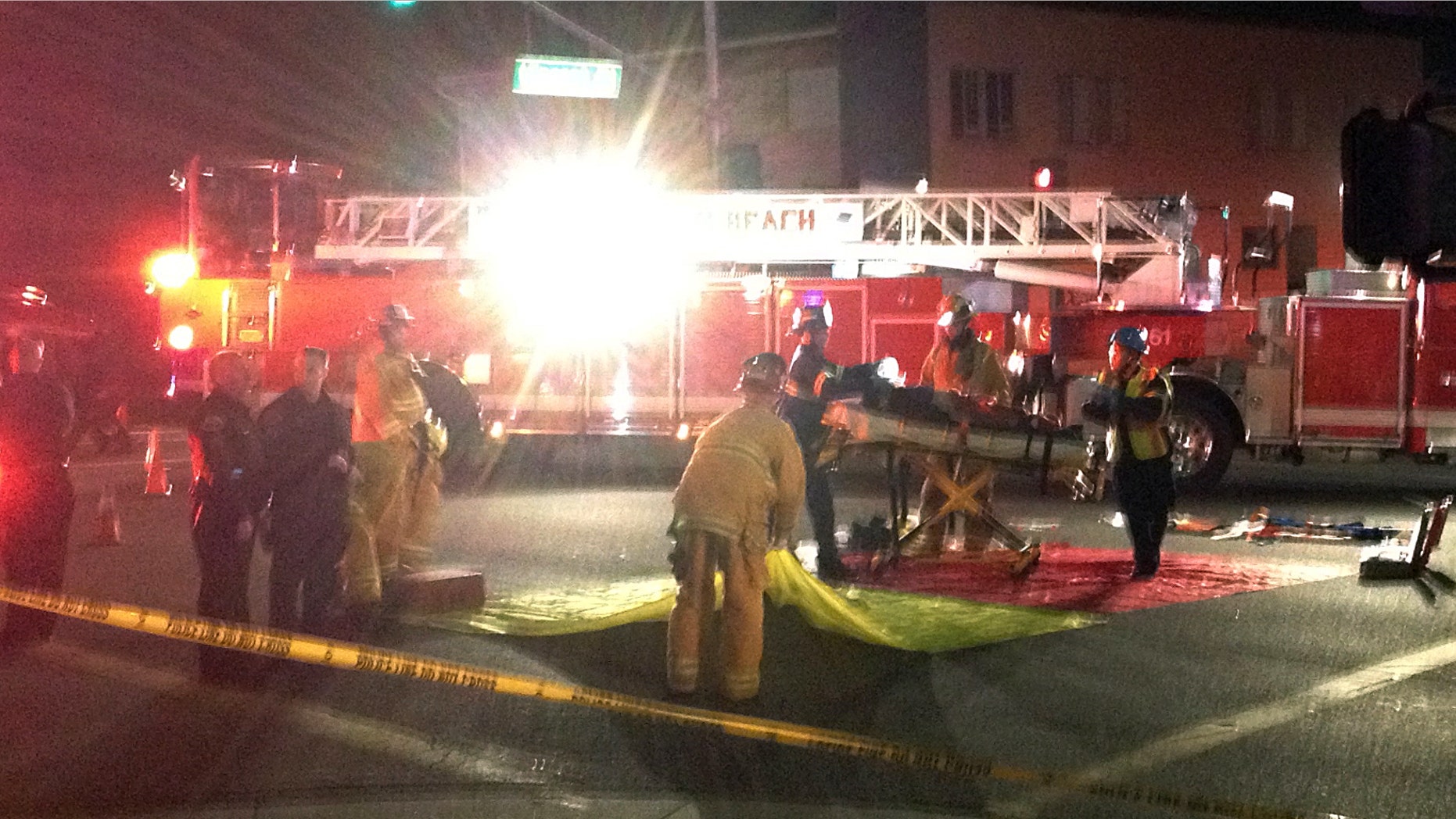 Dec. 17, 2014: n this photo provided by Mark Milutin, firefighters carry a victim from a triage area after a driver suspected of being intoxicated hit a group of pedestrians and another car outside a church as a Christmas service ended in the Los Angeles suburb of Redondo Beach, Calif.