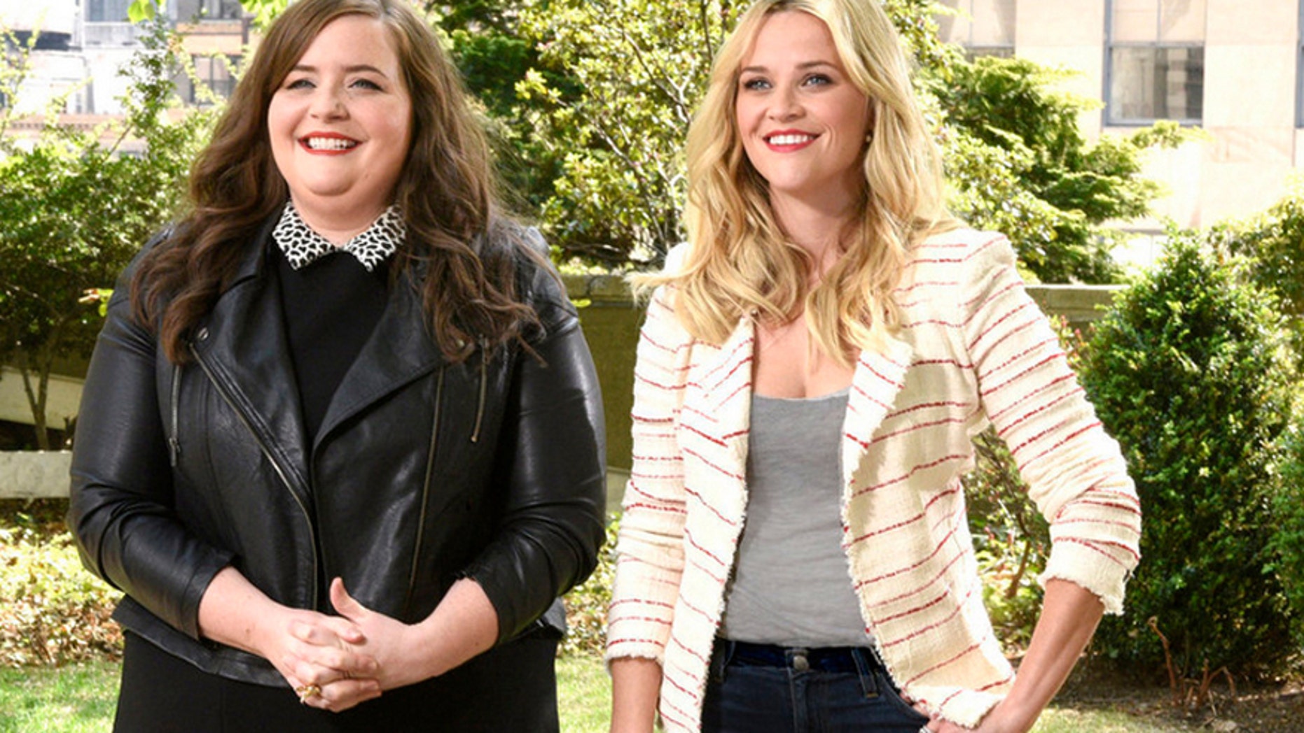 "SNL" castmember Aidy Bryan and actress Reese Witherspoon pose for a promo shot for the NBC show.