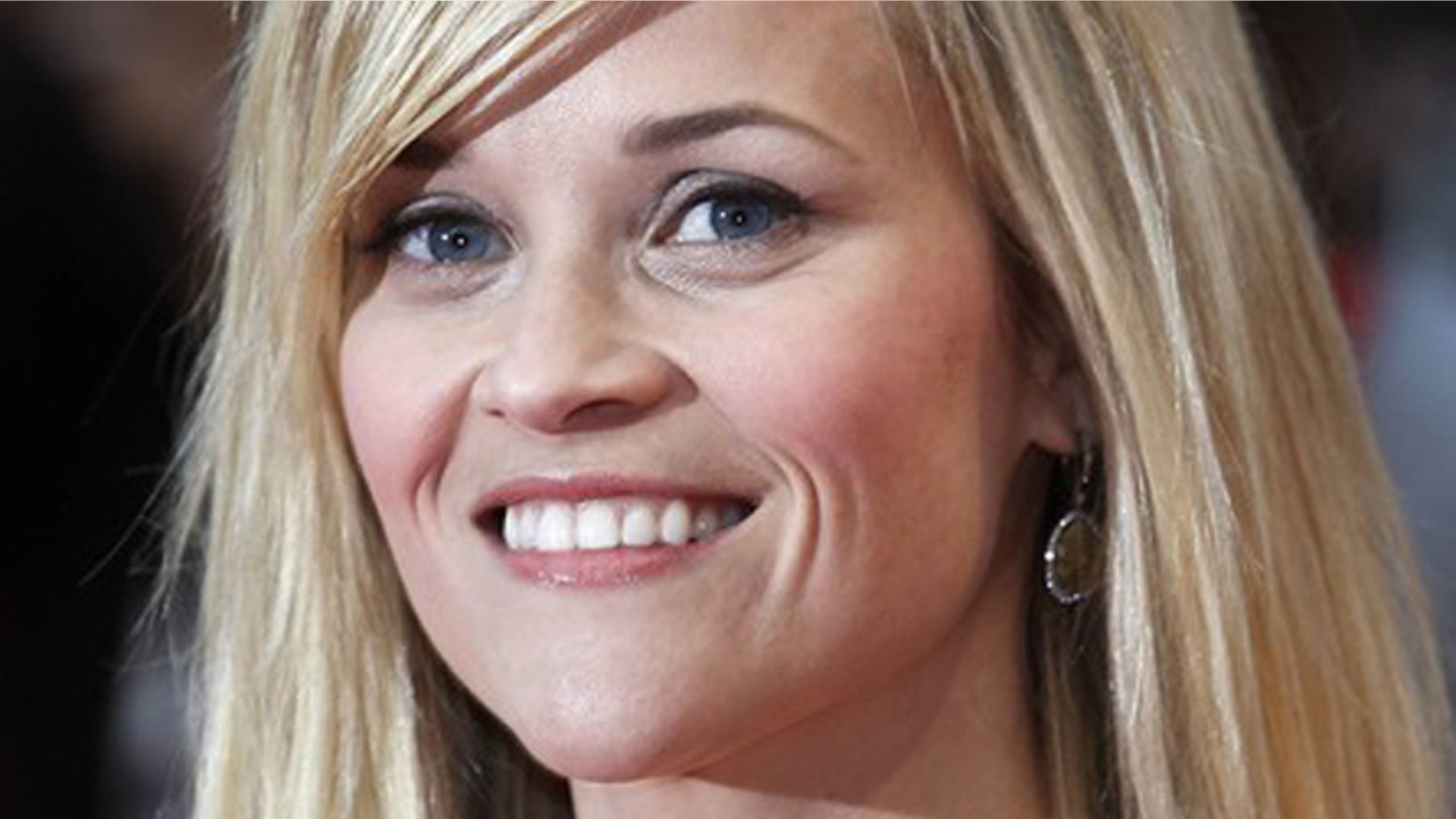 Actress Reese Witherspoon poses for photographers at the premiere of Water for Elephants at the Westfield, in London May 3, 2011.